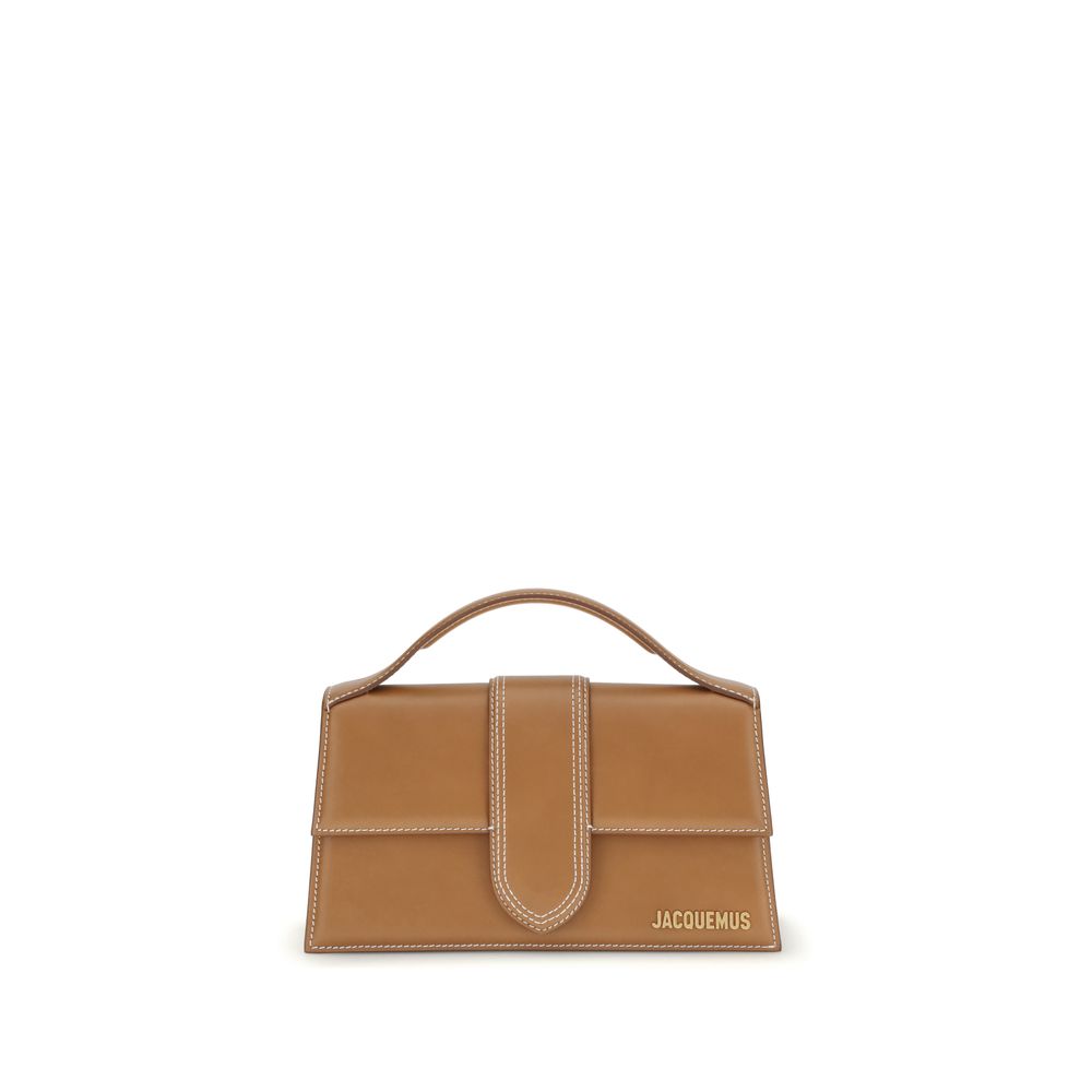 Indulge in the exquisite Jacquemus Brown Calf Leather Bos Taurus Handbag, a masterclass in luxury craftsmanship, perfect for those who appreciate timeless elegance.