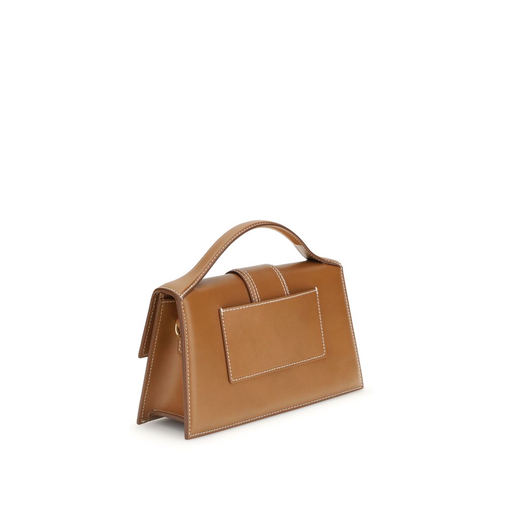 Discover the Jacquemus Brown Calf Leather Bos Taurus Handbag, a masterpiece of SS26 craftsmanship, blending timeless elegance with luxurious versatility for the discerning connoisseur.