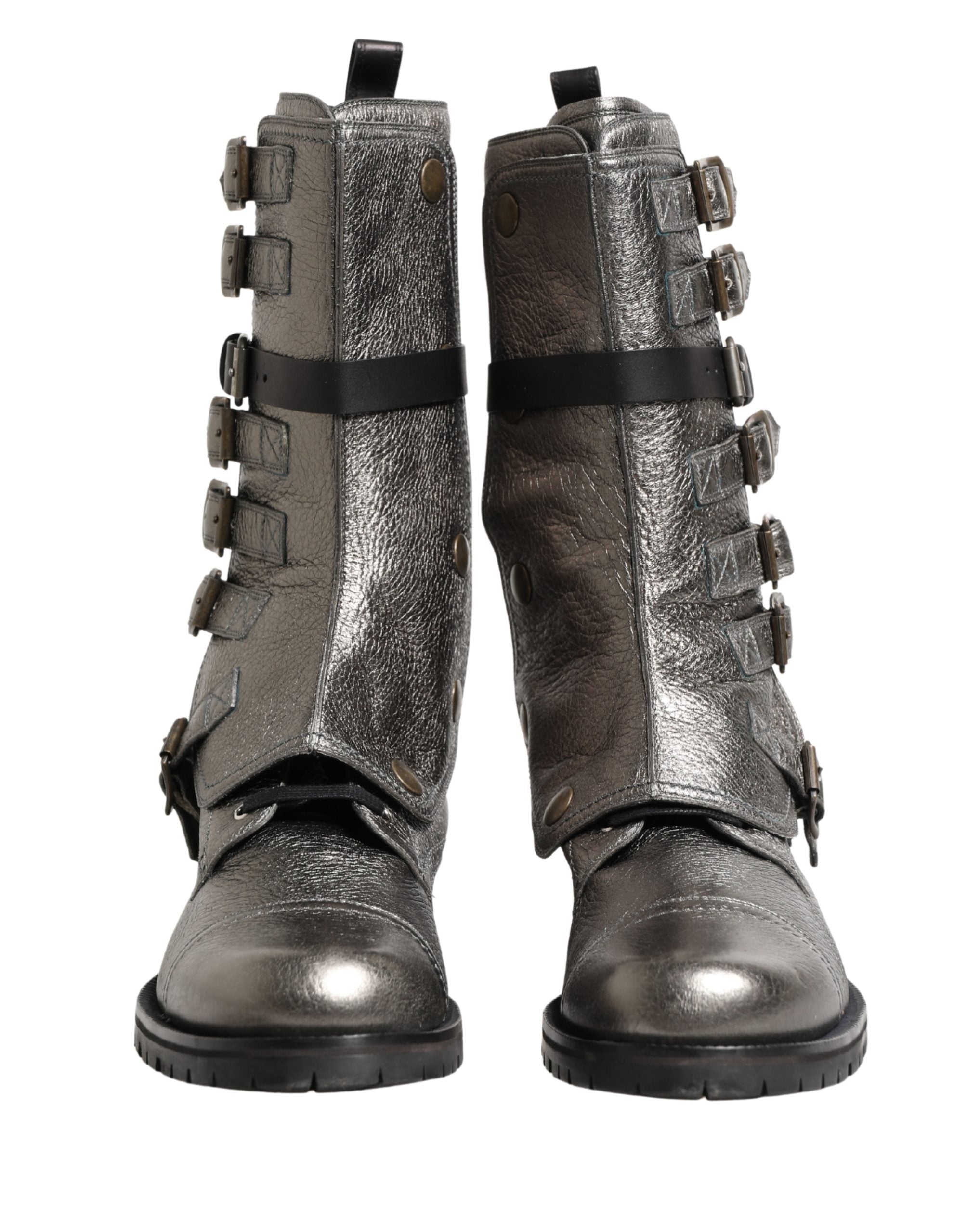 Experience the allure of Dolce & Gabbana's Metallic Silver Combat Biker Boots, where exquisite leather craftsmanship meets bold elegance for a statement of luxury.