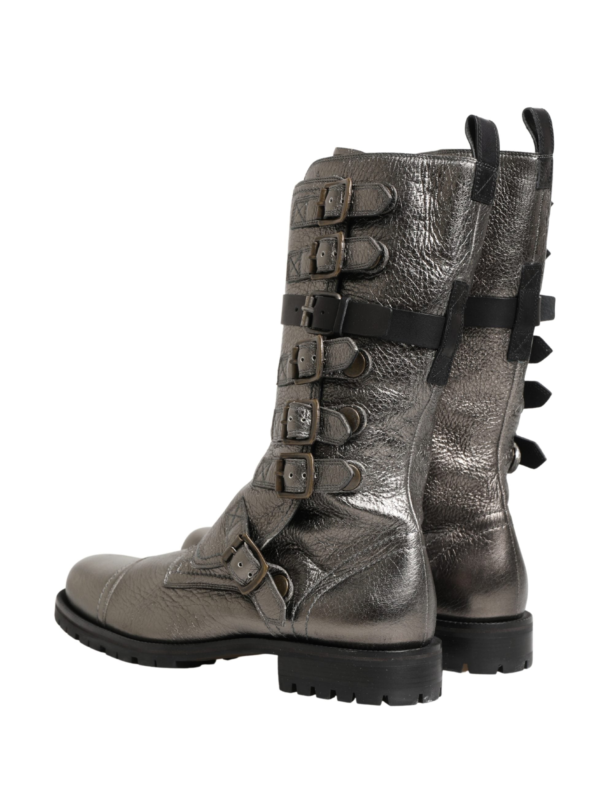 Elevate your style with Dolce & Gabbana's Metallic Silver Combat Biker Boots, where exquisite leather craftsmanship meets bold luxury for a timeless statement.