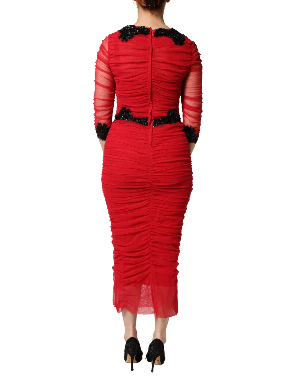 Discover the Dolce & Gabbana Red Mesh Trim Bodycon Sheath Midi Dress, a masterpiece of Italian craftsmanship that embodies elegance and sophistication for unforgettable evenings.