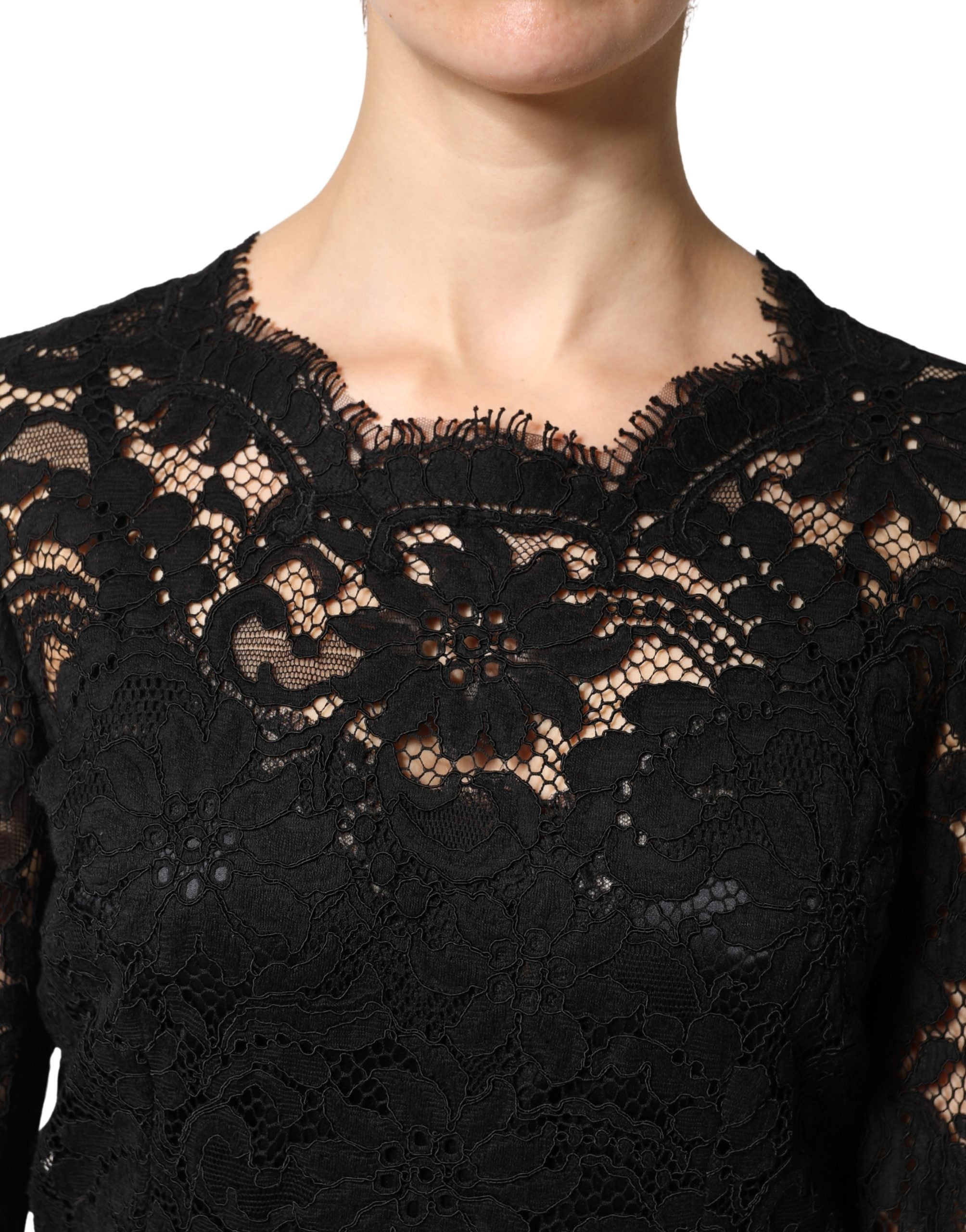 Discover the allure of the Dolce & Gabbana Black Lace Long Sleeves Cotton Maxi Dress, where exquisite craftsmanship meets luxurious materials for an unforgettable statement.