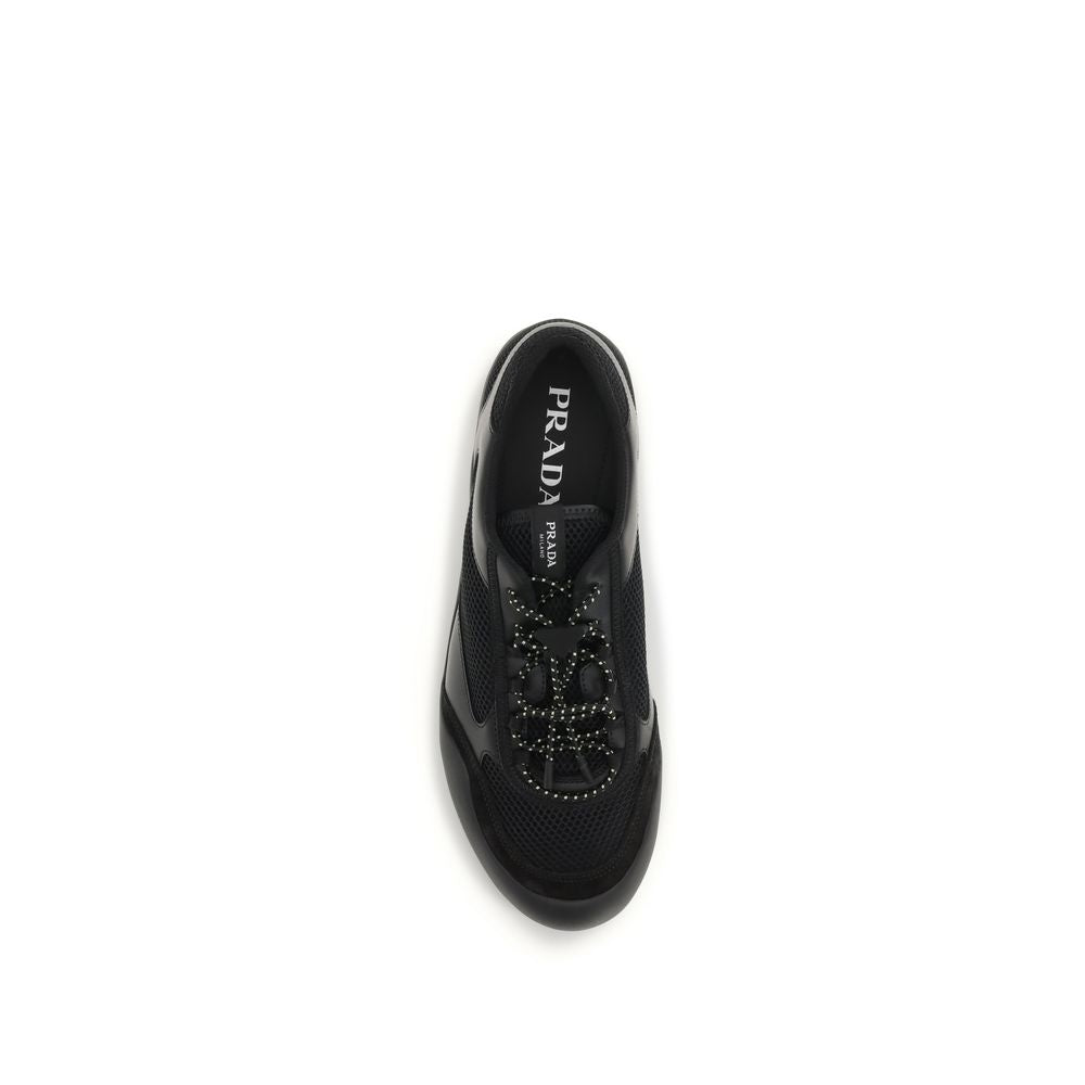 Elevate your style with Prada's Black Polyester Athletic Sneakers, a luxurious blend of performance and aesthetic, perfect for the discerning individual seeking comfort and sophistication.