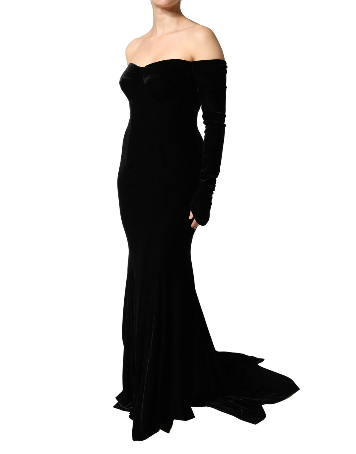 Experience the allure of the Dolce & Gabbana Black Off Shoulder Bodycon Long Gown Dress, a masterpiece of Italian craftsmanship that redefines elegance for any luxurious occasion.