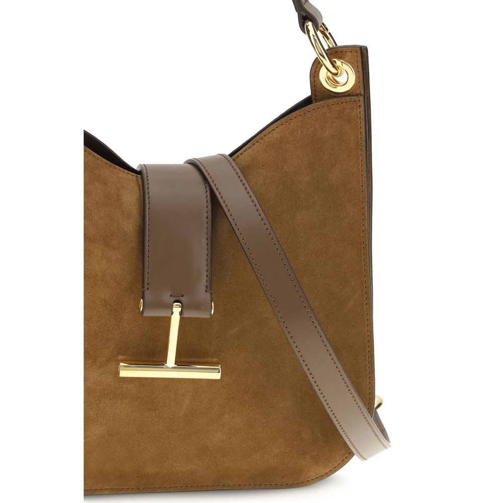 Elevate your style with the Tom Ford Brown Calf Leather Bos Taurus Shoulder Bag, a masterpiece of exquisite craftsmanship and luxurious materials, perfect for the discerning individual.