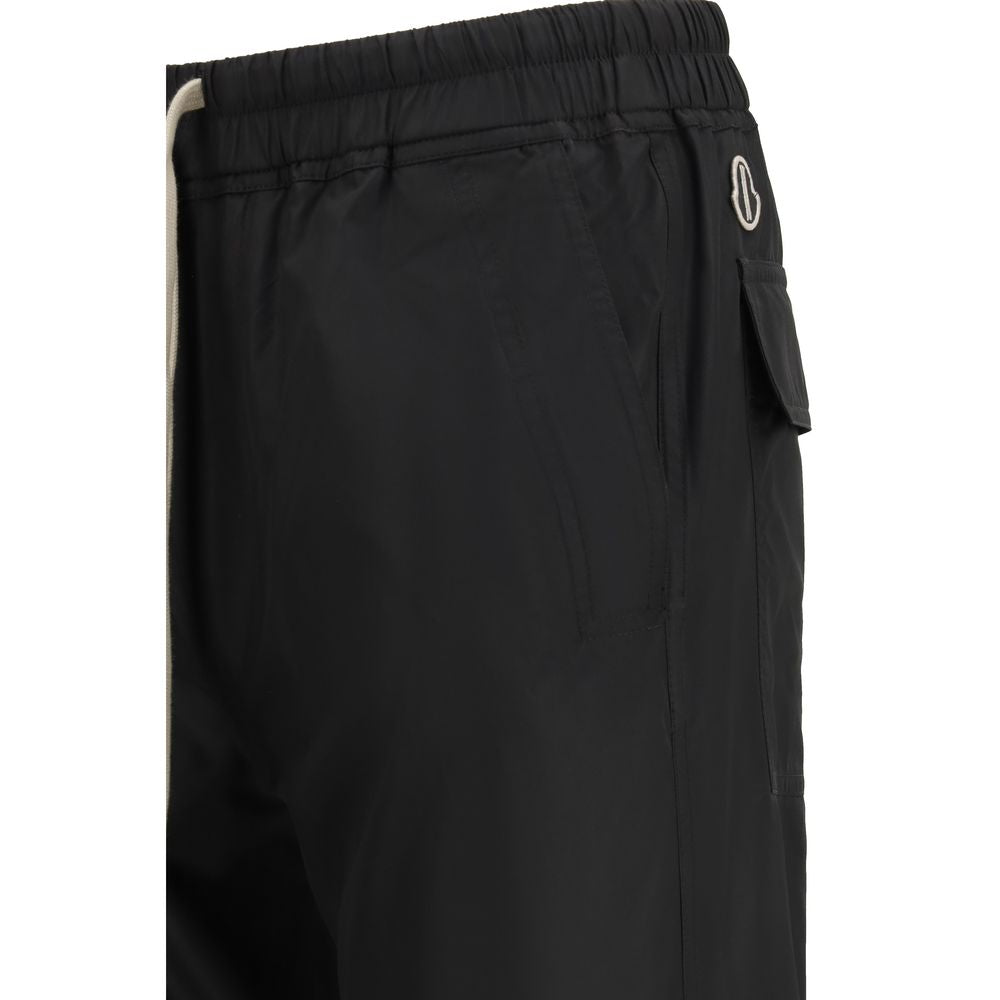 Elevate your wardrobe with Moncler x Rick Owens Black Polyester Casual Pants, a masterpiece of minimalist elegance and exceptional craftsmanship for the discerning individual.