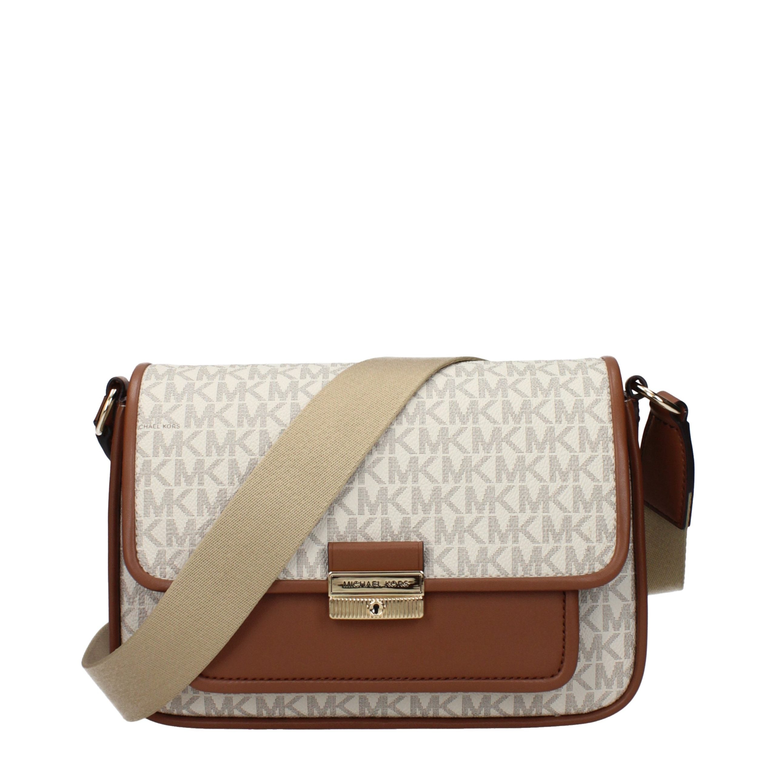 Discover the Michael Kors Beige Fabric Crossbody Bag, a masterpiece of exquisite craftsmanship and timeless elegance, perfect for elevating your style in any setting.