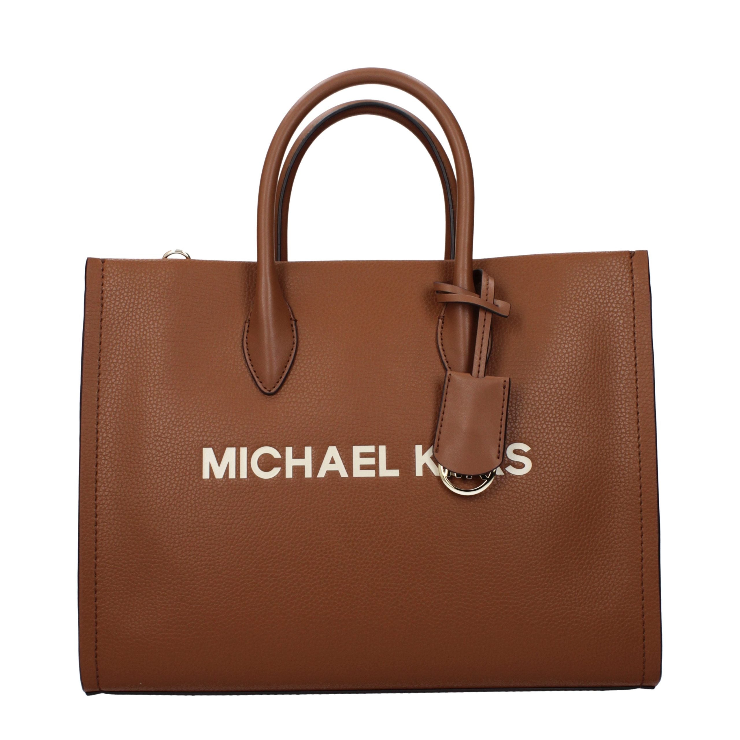 Discover the Michael Kors Brown Leather Handbag, a luxurious blend of timeless elegance and versatile craftsmanship, perfect for the discerning individual.