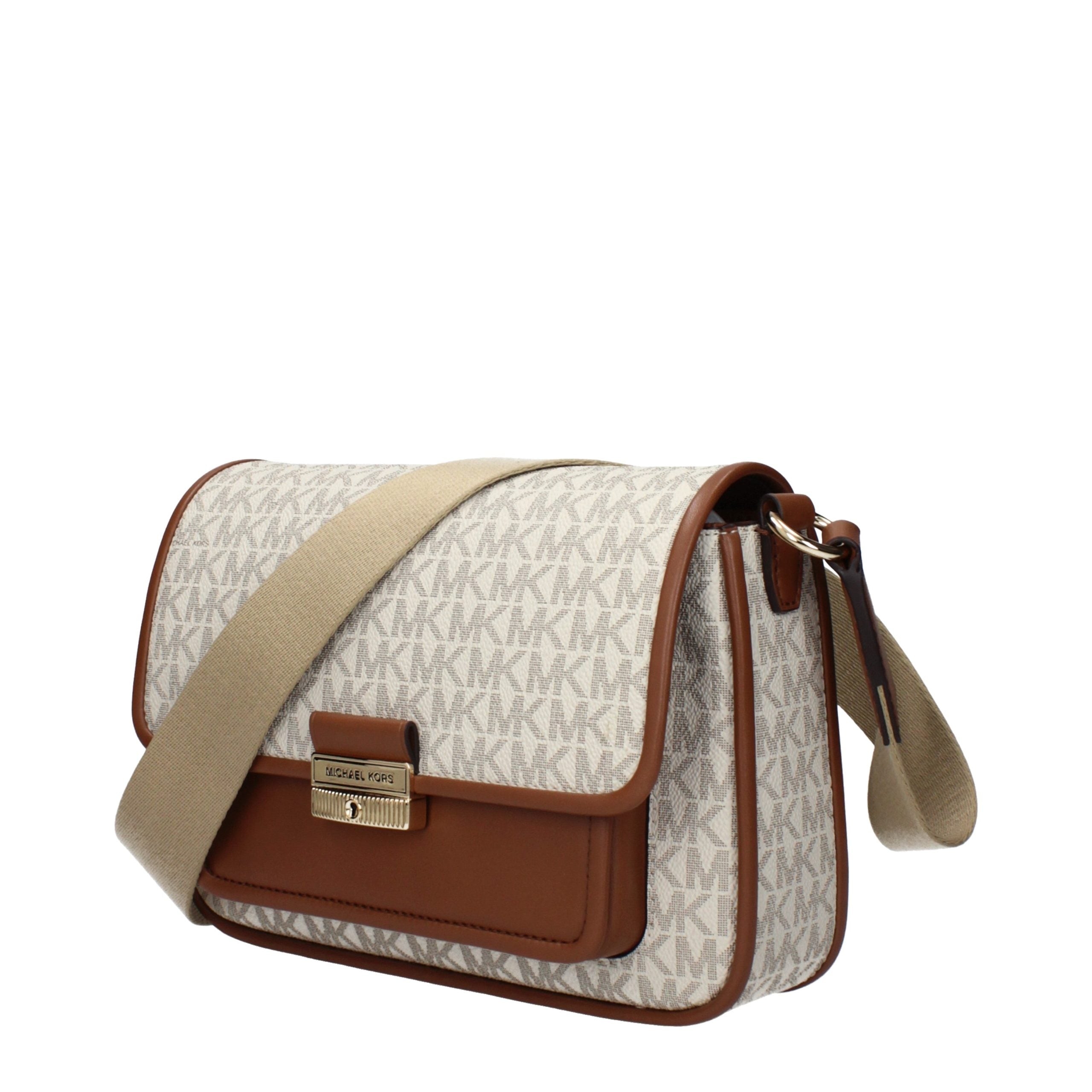 Discover the Michael Kors Beige Fabric Crossbody Bag, a masterpiece of exquisite craftsmanship and timeless elegance, perfect for elevating your style in any setting.