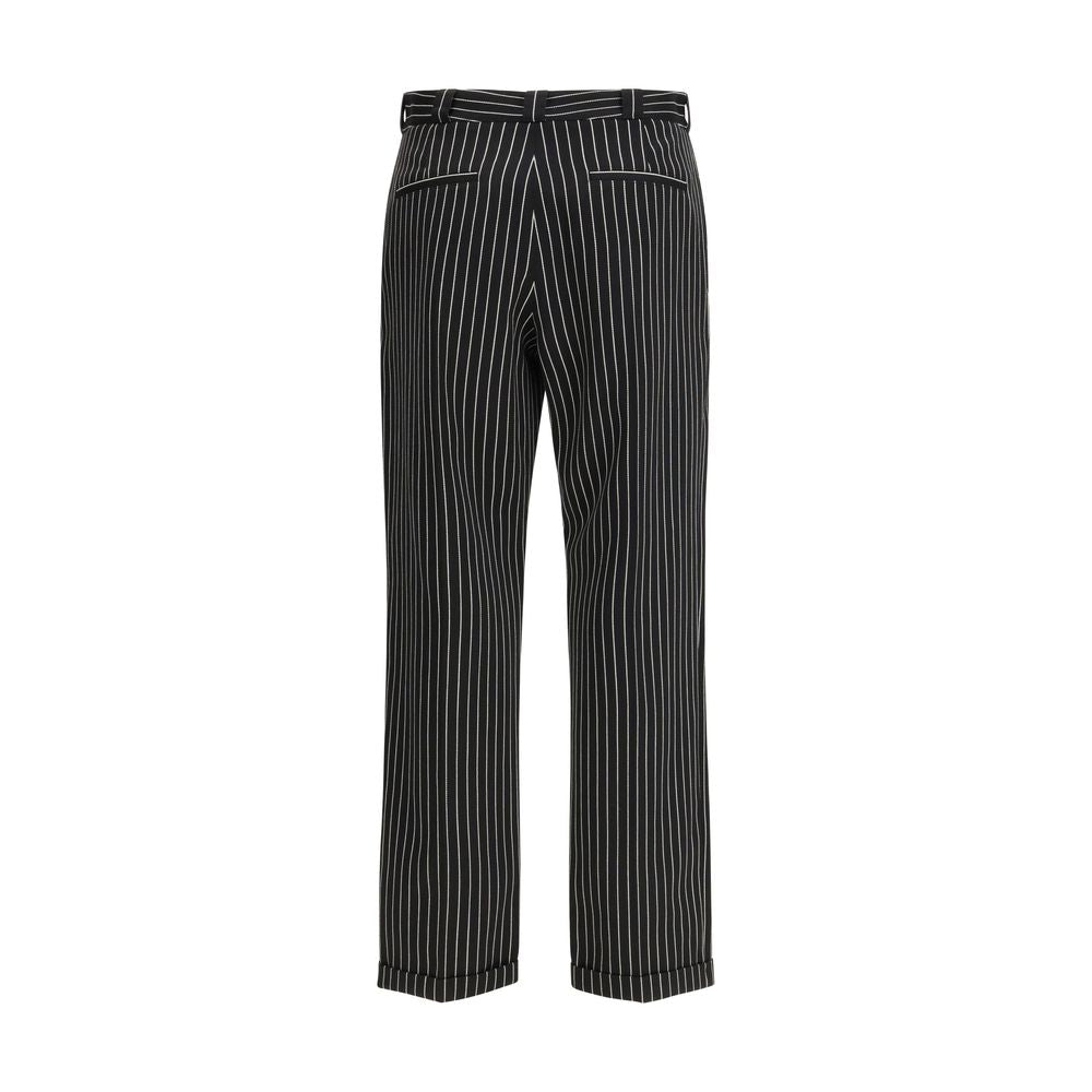Discover the Tom Ford Black Fleece Wool Chino Pants, a blend of 70% fleece wool and 30% cotton, embodying timeless elegance and superior craftsmanship for the discerning individual.