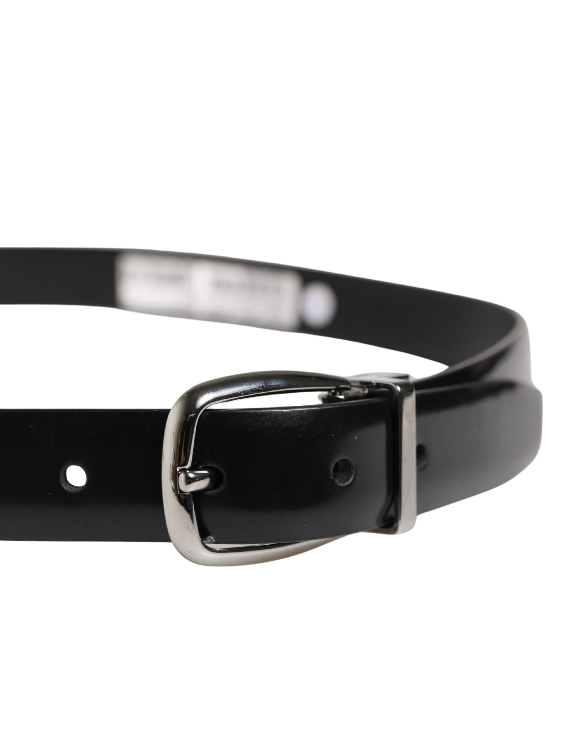 Elevate your style with the Dolce & Gabbana Men Black Classic Leather Metal Buckle Belt, a masterpiece of Italian craftsmanship in luxurious calf leather, perfect for the discerning individual.