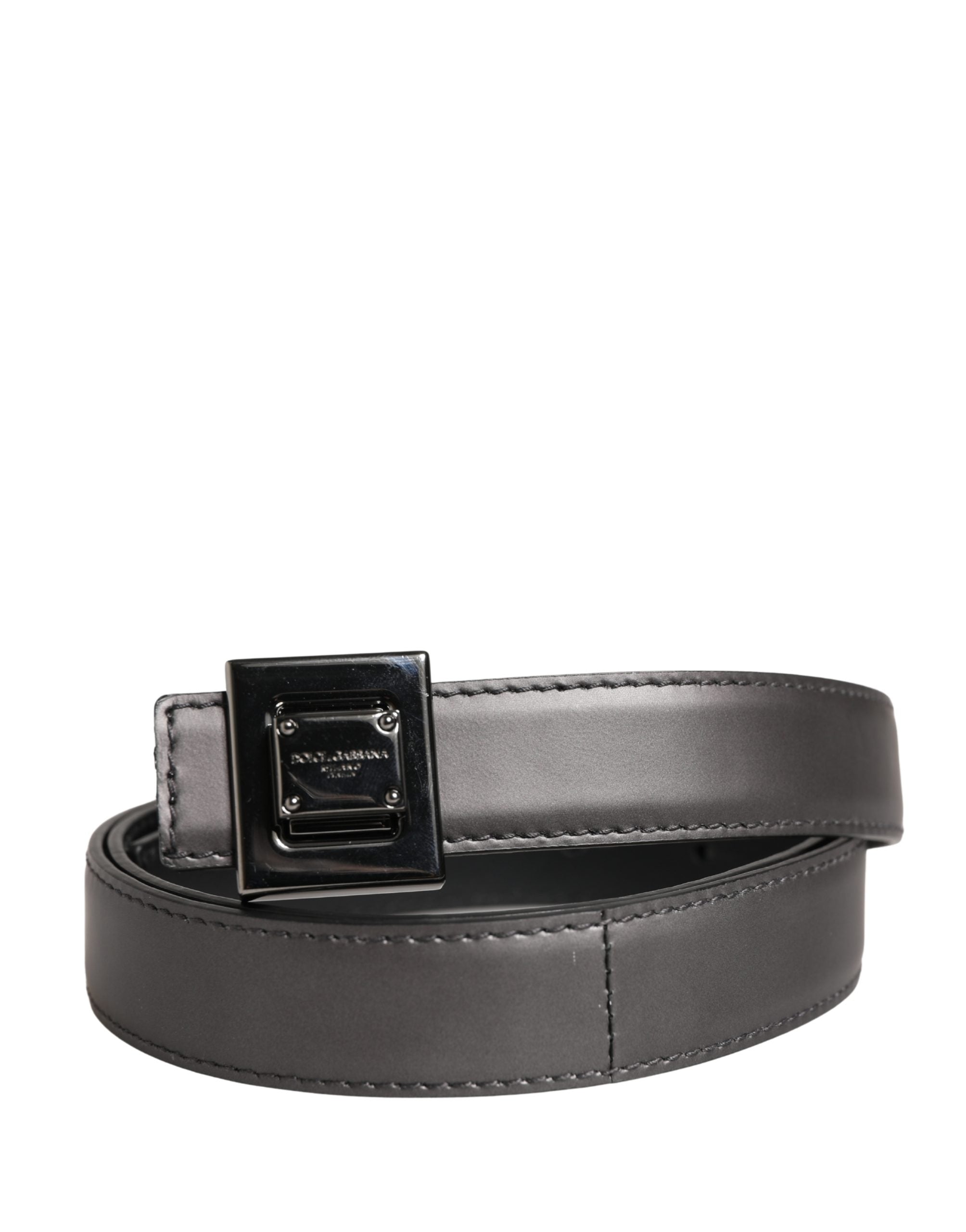 Experience the exquisite Dolce & Gabbana Men Silver Classic Leather Square Buckle Belt, a masterclass in Italian craftsmanship, blending luxurious lamb leather with timeless elegance.