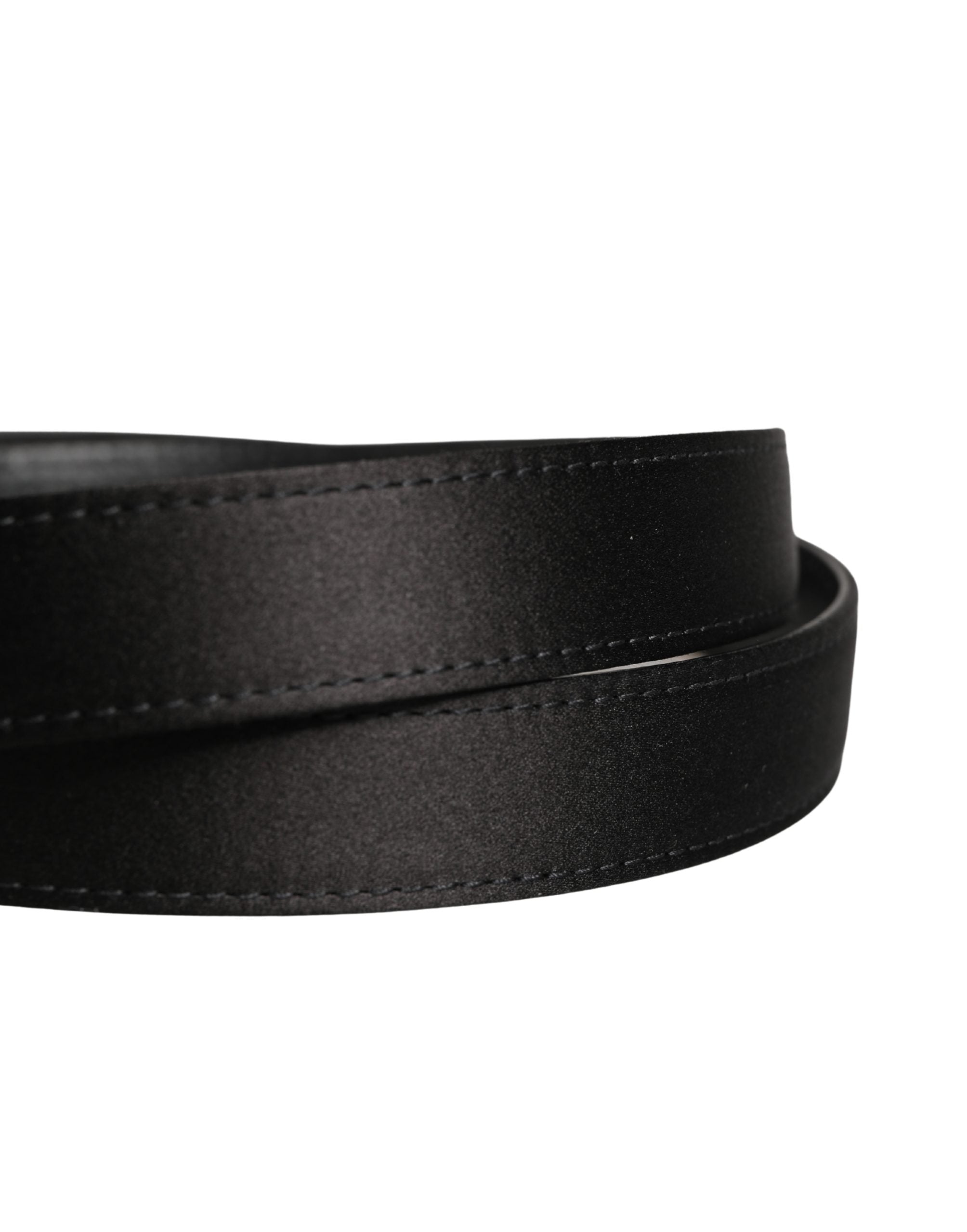 Discover the Dolce & Gabbana Men Black Classic Viscose Metal Buckle Belt, an embodiment of Italian luxury crafted from exquisite materials, perfect for elevating any ensemble.