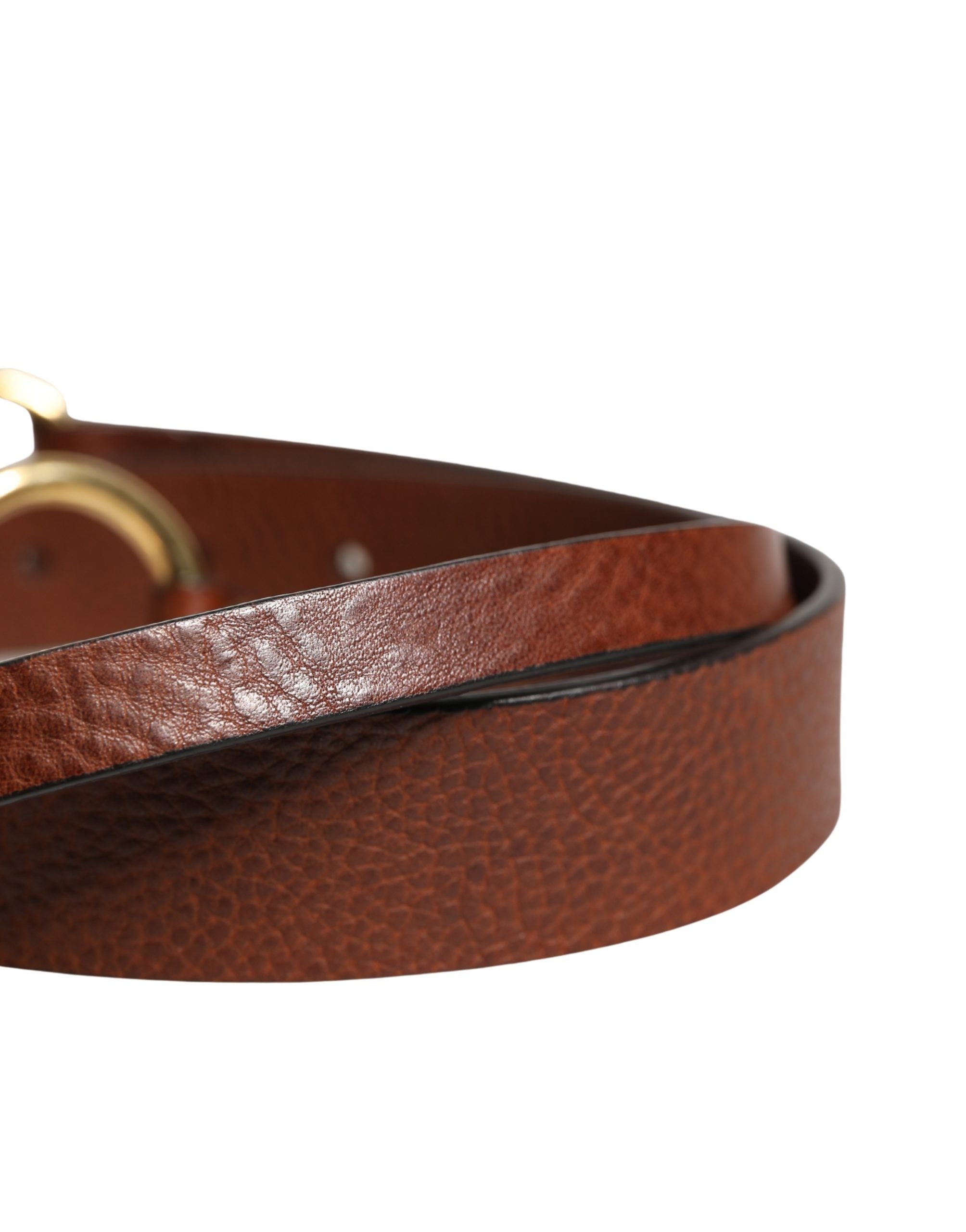 Elevate your style with the Dolce & Gabbana Men Brown Classic Leather Metal Buckle Belt, a masterpiece of Italian craftsmanship in luxurious calf leather, embodying timeless sophistication.