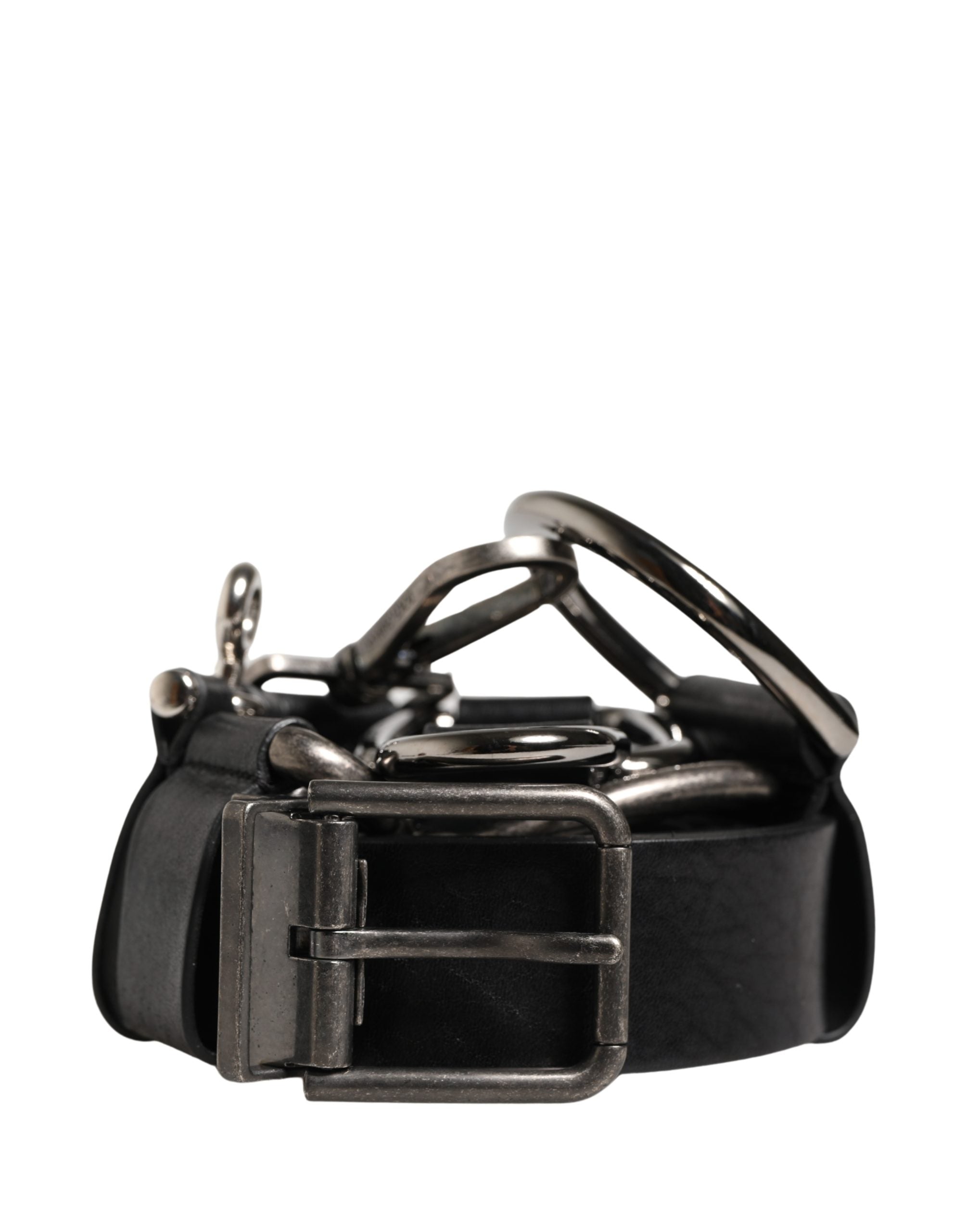 Elevate your style with the Dolce & Gabbana Black Calf Leather Silver Metal Buckle Belt, a testament to exquisite Italian craftsmanship that embodies timeless luxury and sophistication.