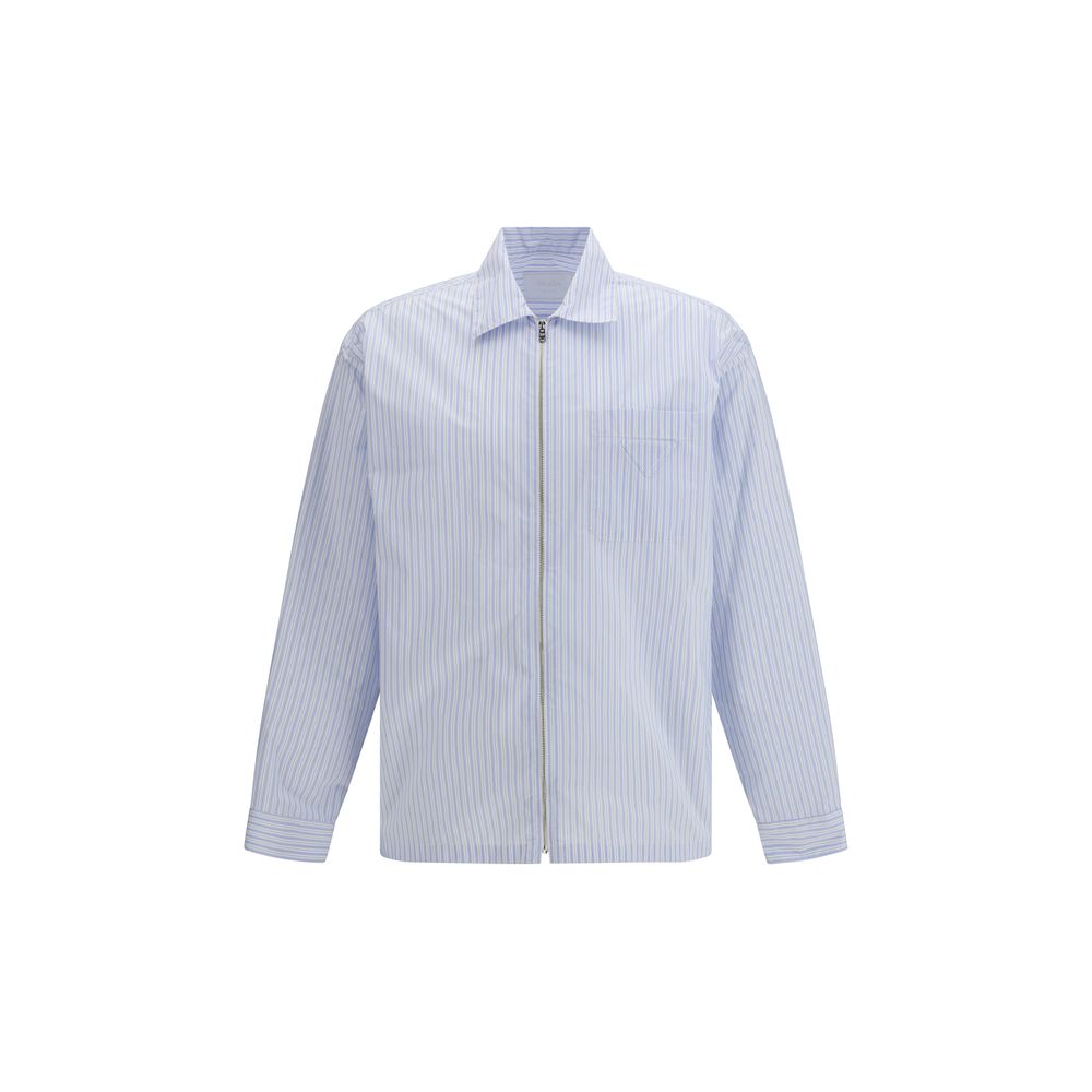 Indulge in the Prada Blue Polyamide Pattern Shirt, a masterpiece of innovative re-nylon, blending luxury and sustainability for the discerning individual.