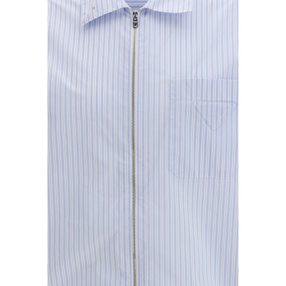 Elevate your wardrobe with the Prada Blue Polyamide Pattern Shirt, a sustainable luxury piece from SS26, crafted in innovative re-nylon for timeless sophistication.