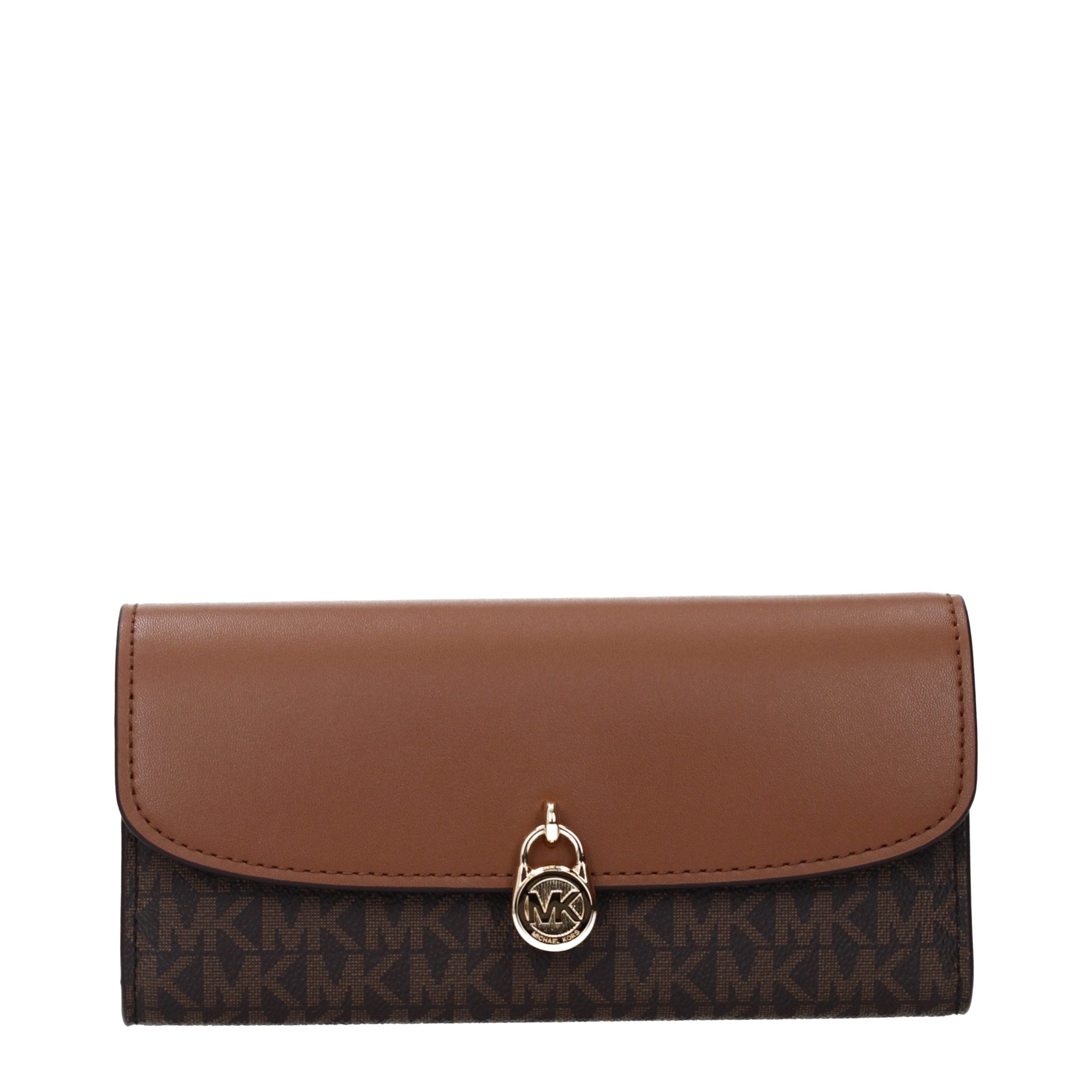 Discover the Michael Kors Brown Fabric Wallet, an exquisite blend of luxury and sophistication, designed for those who appreciate timeless elegance and impeccable craftsmanship.