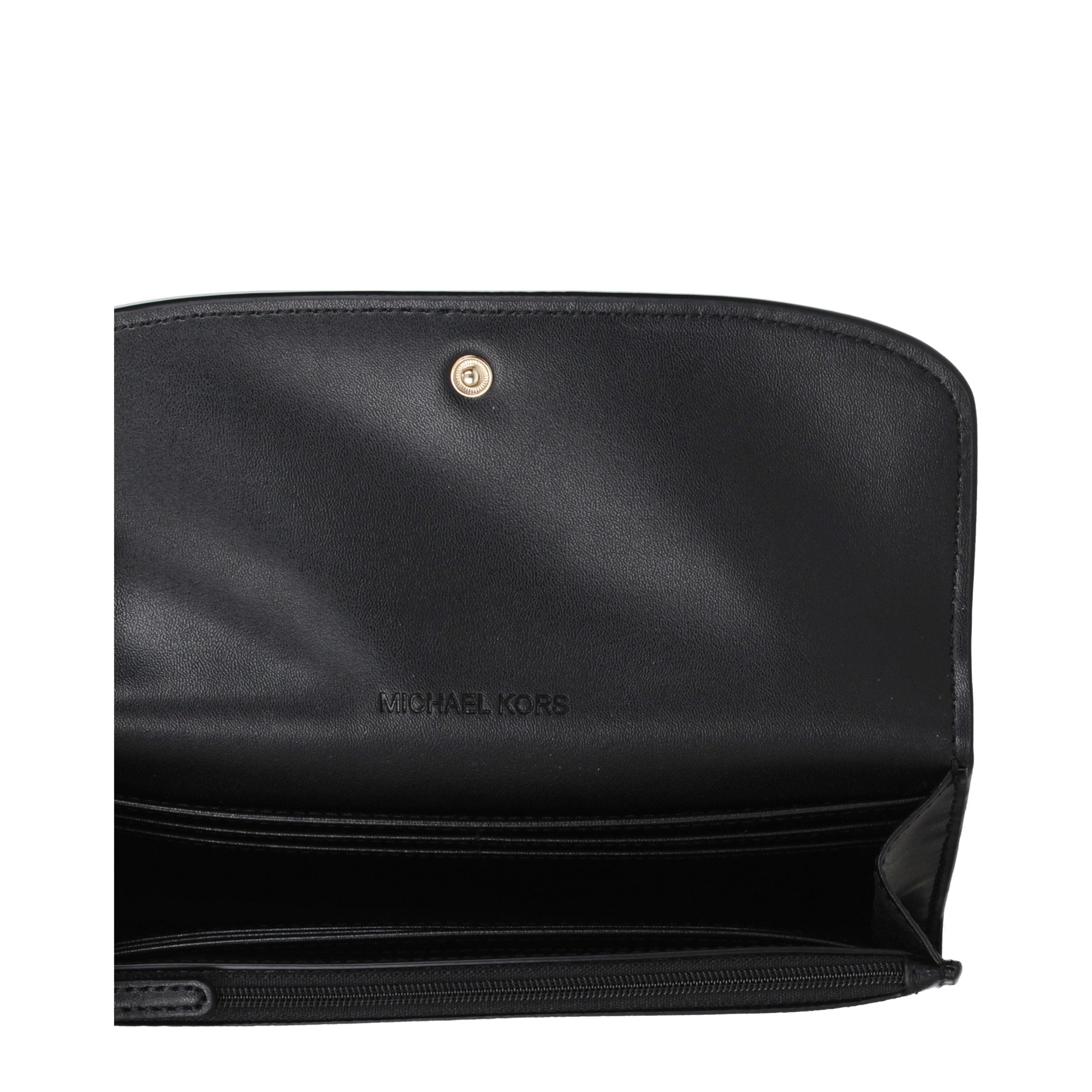 Discover the Michael Kors Black Leather Wallet, a 2023 masterpiece of premium craftsmanship that embodies timeless elegance and sophisticated luxury for discerning individuals.