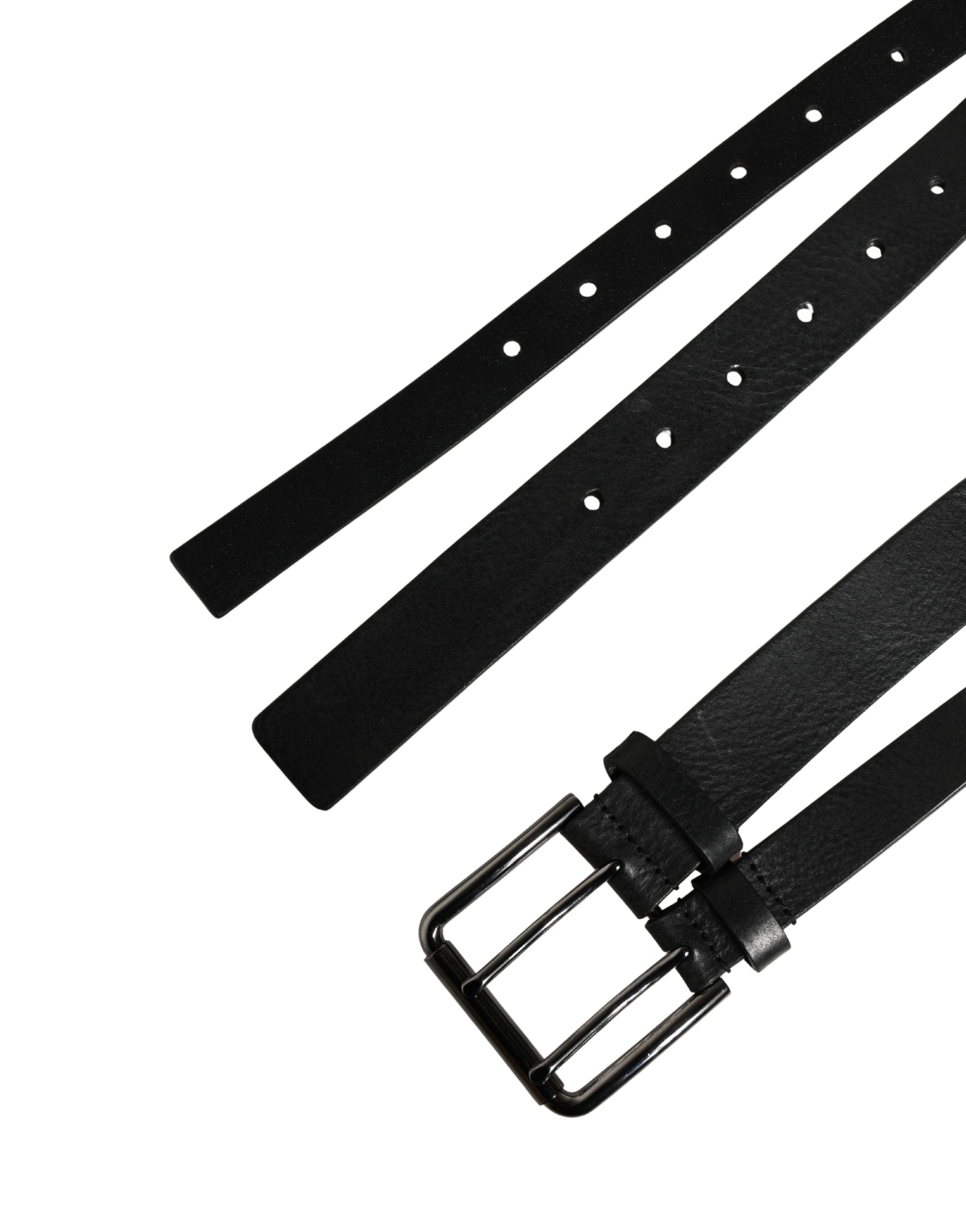 Discover the Dolce & Gabbana Black Double Strap Leather Silver Buckle Belt, a masterpiece of Italian craftsmanship in luxurious calf leather, designed for the discerning individual.