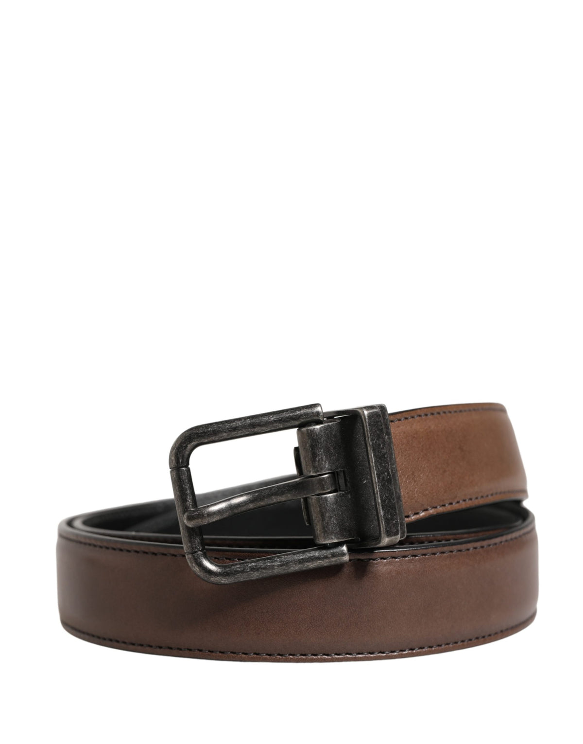 Indulge in the exquisite Dolce & Gabbana Brown Classic Leather Metal Buckle Belt, a timeless accessory crafted from luxurious calf leather, embodying sophistication and elegance.
