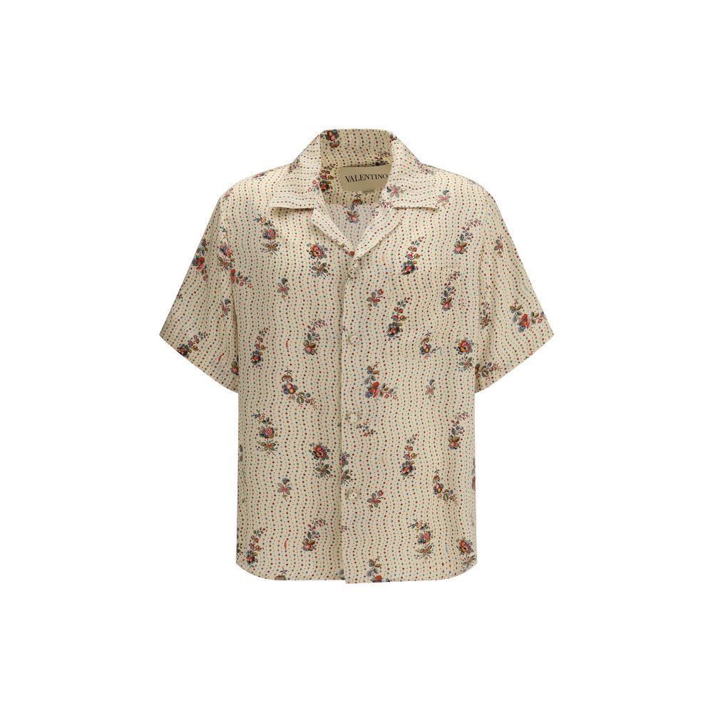 Elevate your style with Valentino's Multicolor Silk Pattern Shirt, a masterpiece of artisanal elegance crafted from luxurious silk, perfect for any sophisticated occasion.