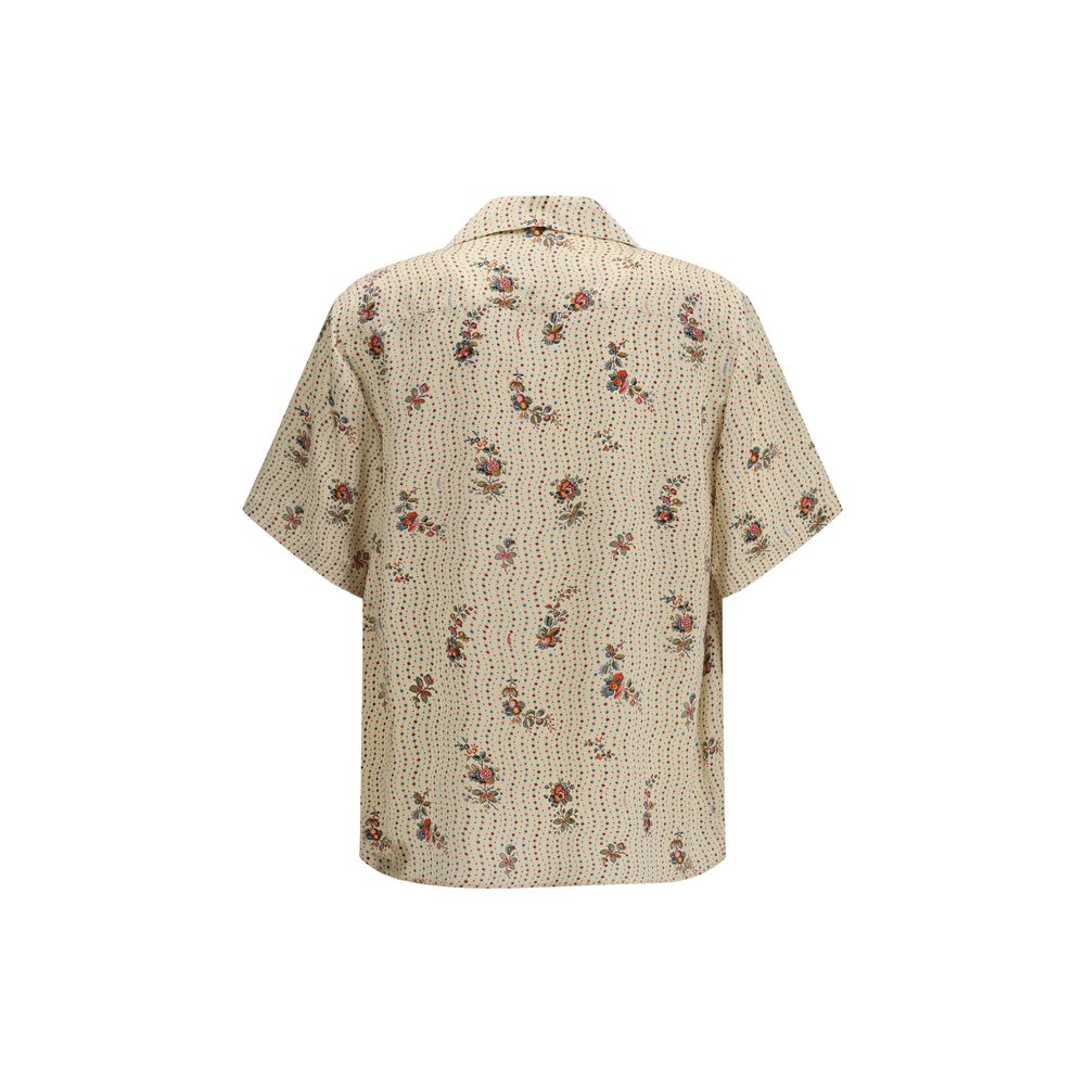 Elevate your style with Valentino's Multicolor Silk Pattern Shirt, a masterpiece of floral artistry and luxurious silk, perfect for any sophisticated occasion.