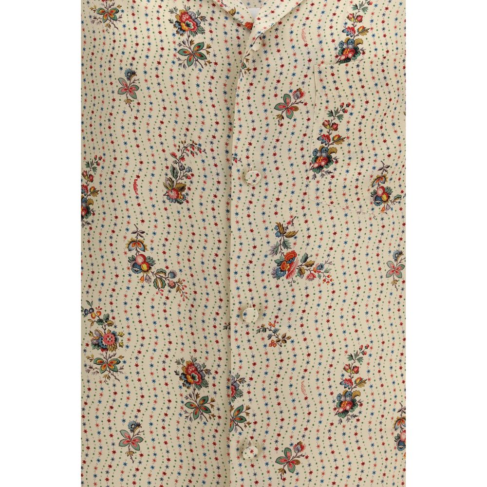 Discover the Valentino Multicolor Silk Pattern Shirt, a masterpiece of artisanal elegance, crafted from luxurious silk, perfect for elevating your sophisticated style.