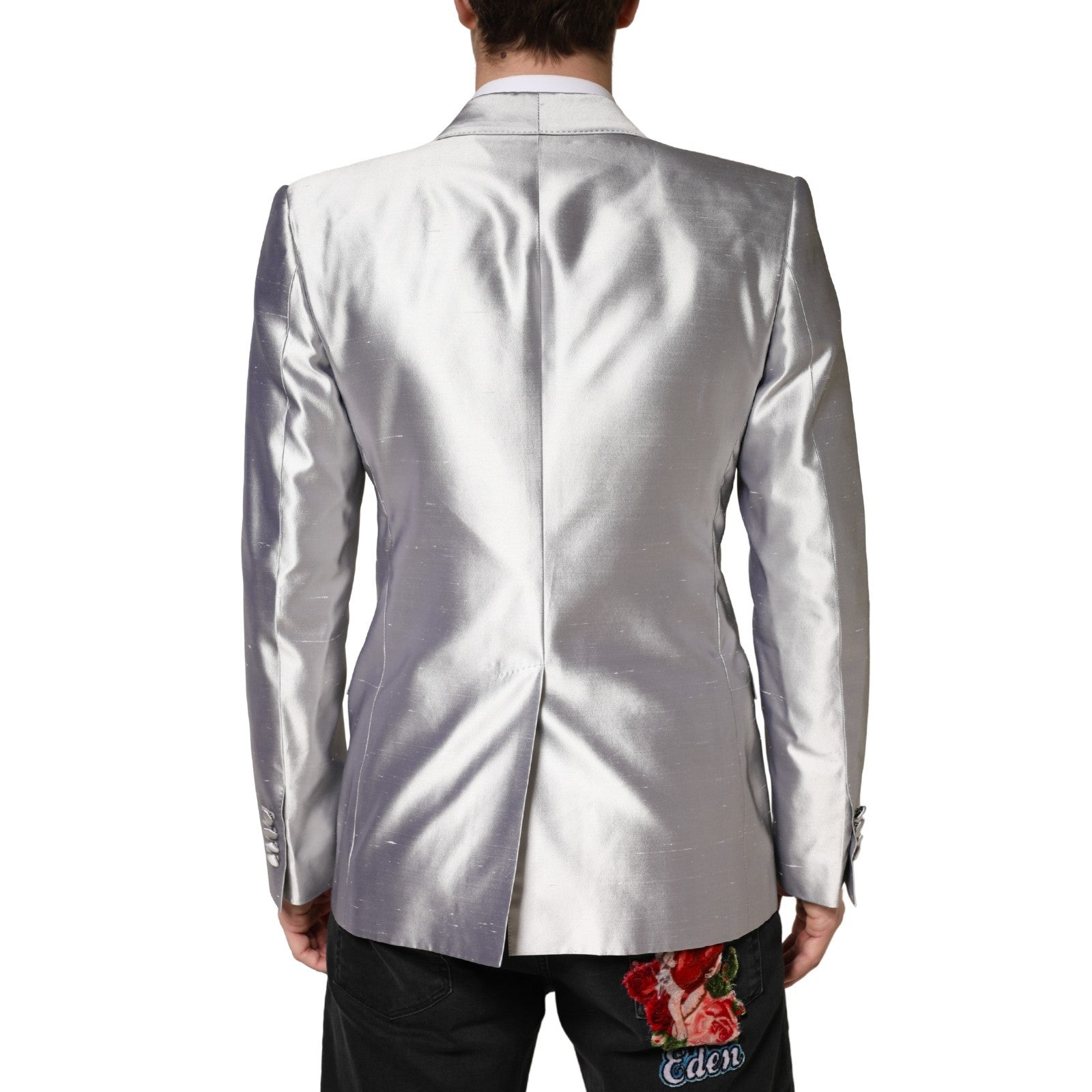 Experience the allure of the Dolce & Gabbana Silver SICILIA Silk Double Breasted Blazer, a testament to Italian craftsmanship that embodies timeless elegance and sophistication.