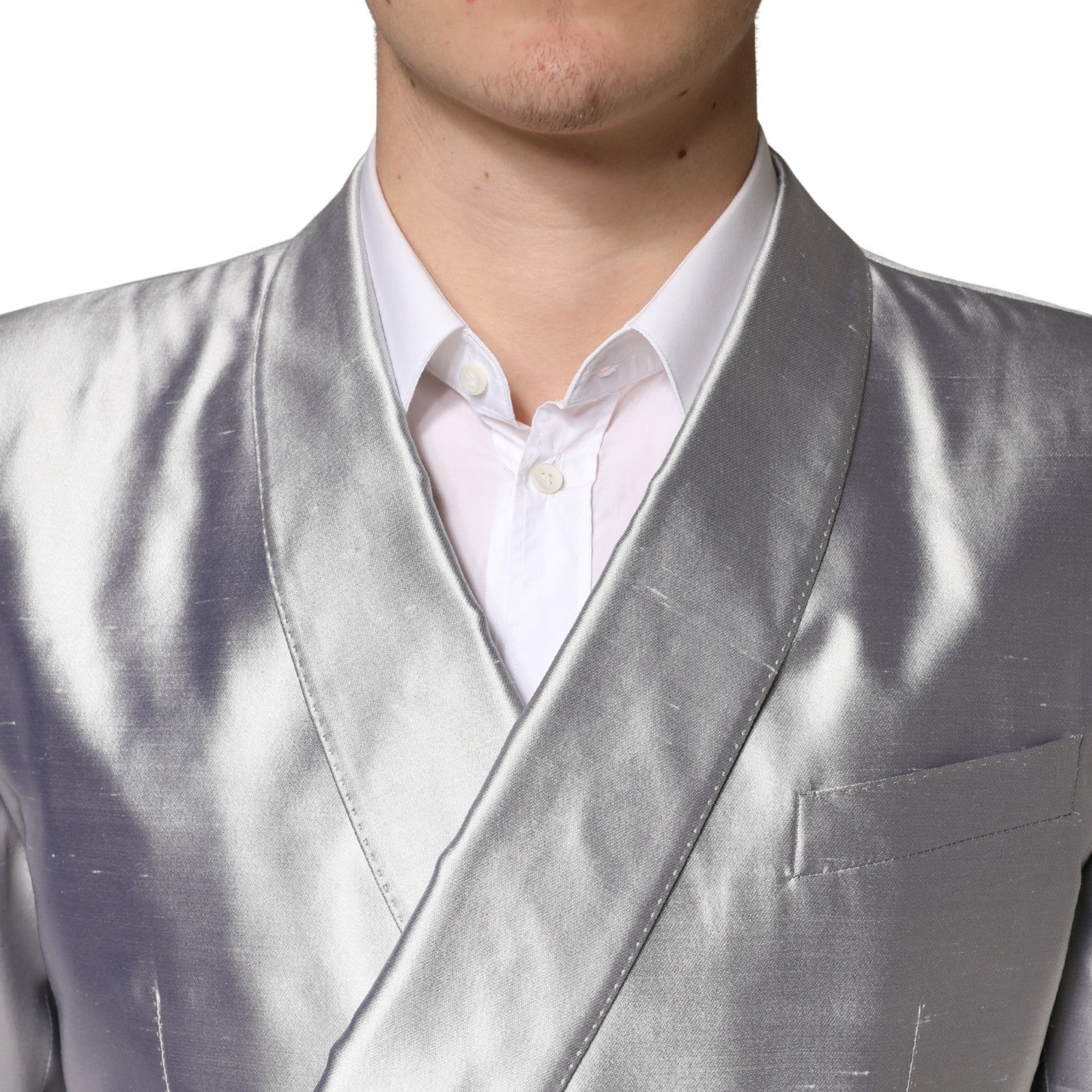 Discover the Dolce & Gabbana Silver SICILIA Silk Double Breasted Blazer, a testament to Italian craftsmanship that embodies timeless elegance and sophistication for every occasion.
