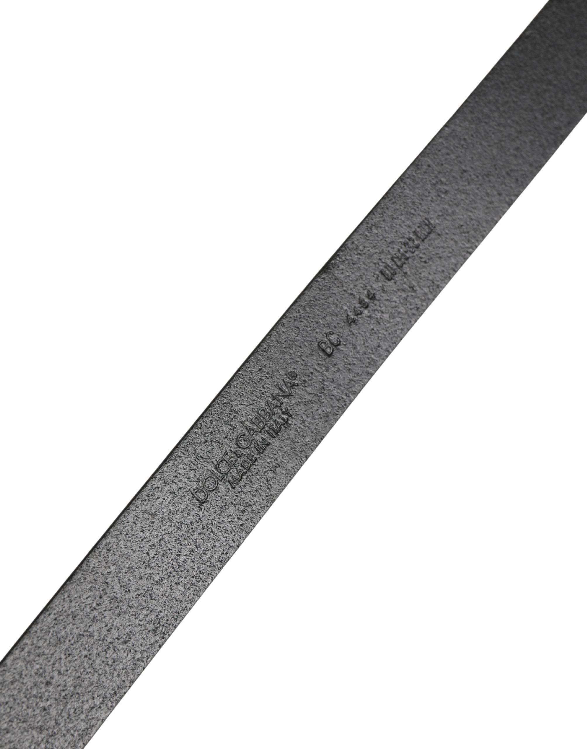 Elevate your style with the Dolce & Gabbana Men Black Classic Leather Metal Buckle Belt, a masterpiece of Italian craftsmanship in luxurious calf leather, perfect for discerning tastes.