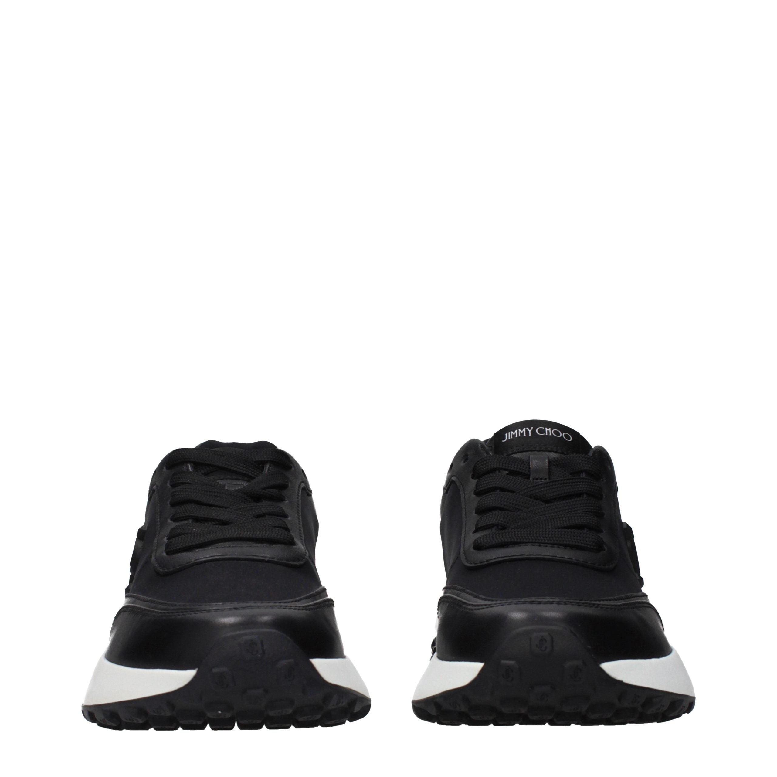 Experience the allure of Jimmy Choo Black Fabric Athletic Sneakers, where exquisite craftsmanship meets contemporary elegance for unparalleled comfort and style.