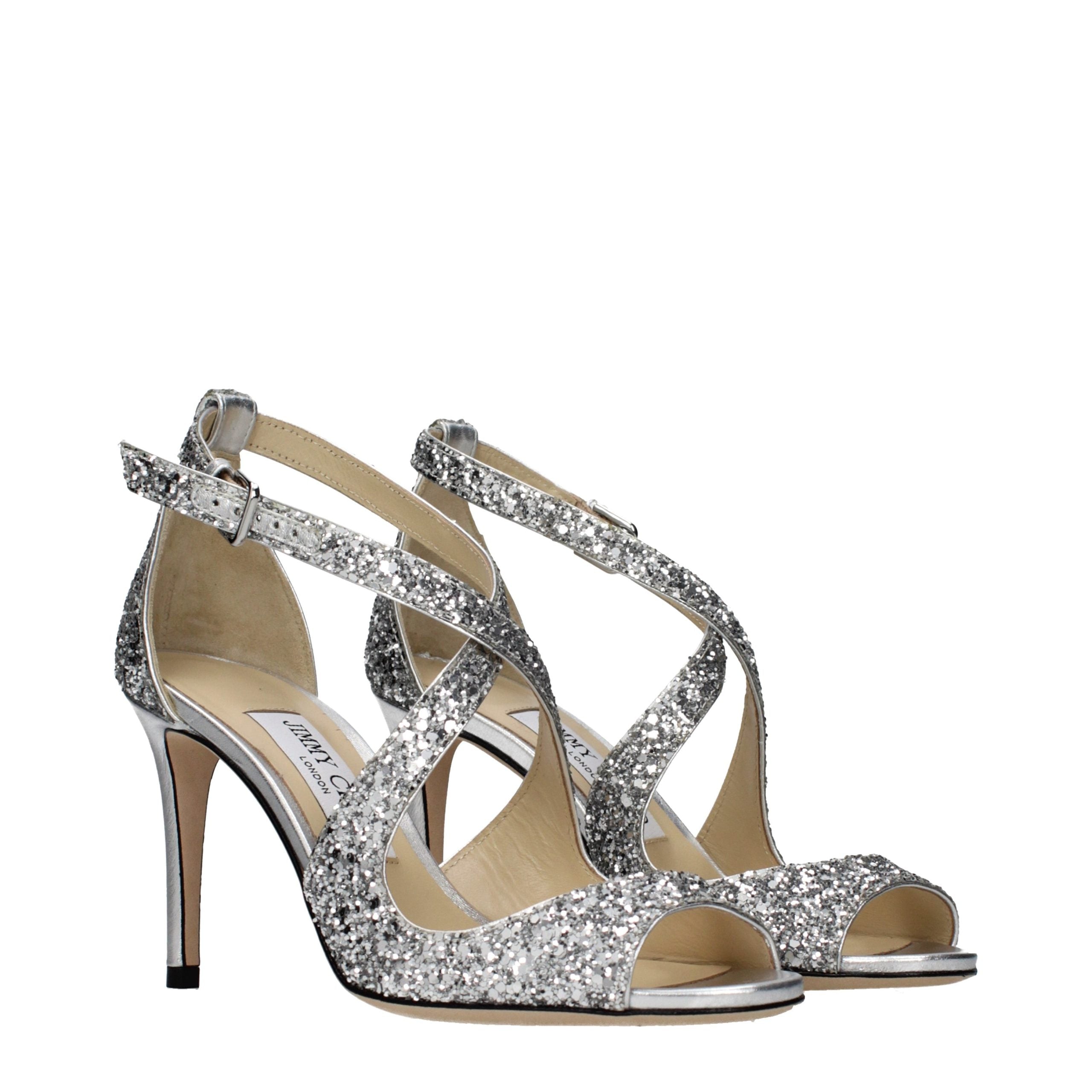 Experience the allure of Jimmy Choo Gray Plastic Strap-On Sandals, where exquisite craftsmanship meets luxurious design for the discerning connoisseur of style.