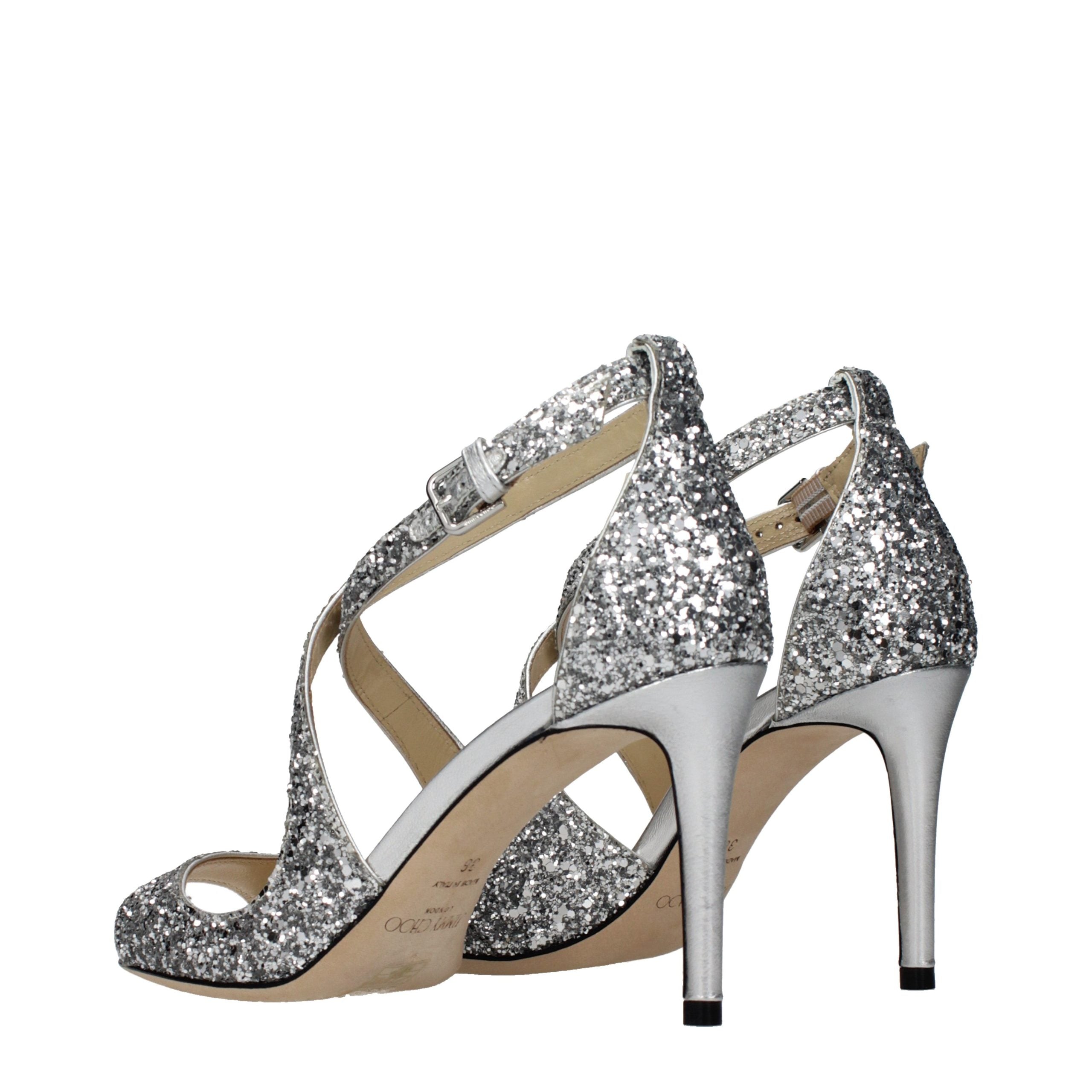 Experience the allure of Jimmy Choo Gray Plastic Strap-On Sandals, where exquisite craftsmanship meets luxurious design, perfect for sophisticated moments.