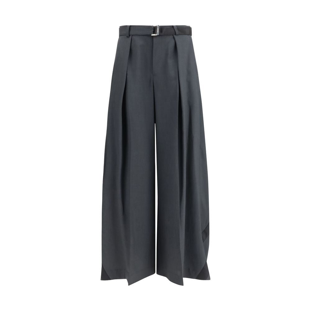 Elevate your wardrobe with Sacai Gray Polyester Casual Pants, a fusion of elegance and comfort crafted from luxurious materials for the discerning individual.