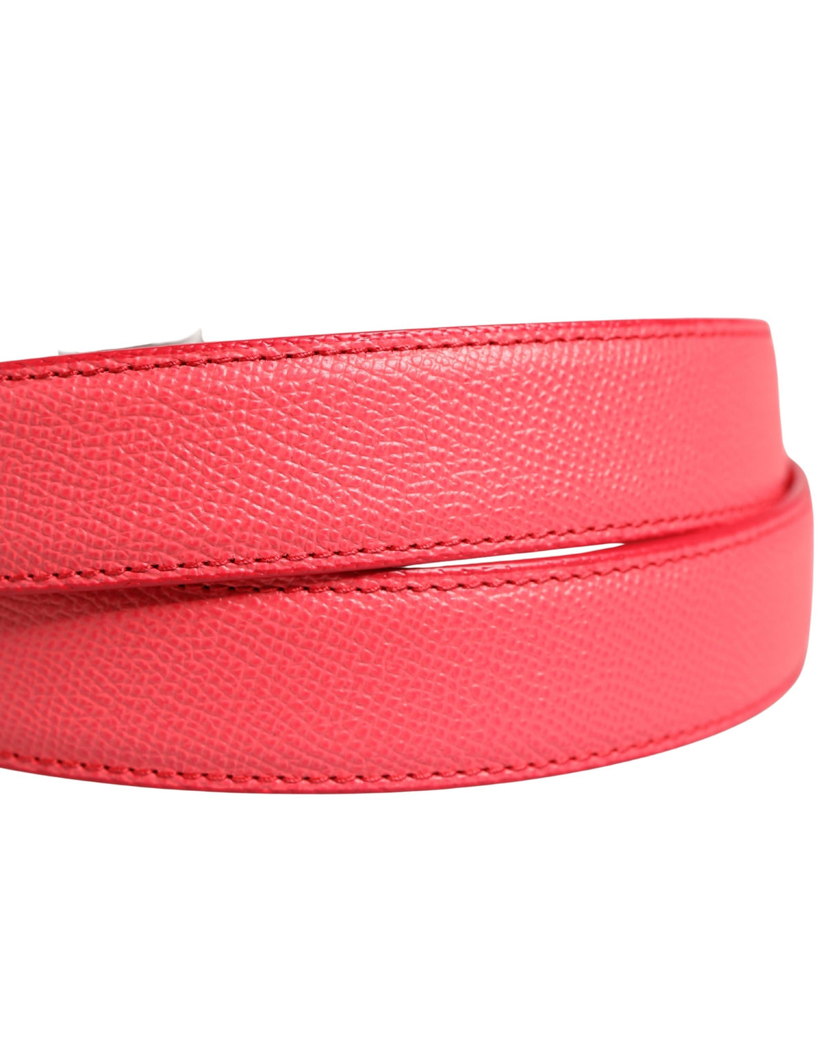 Indulge in the exquisite Dolce & Gabbana Pink Calf Leather Silver Metal Buckle Belt, a luxurious accessory that embodies Italian artistry and timeless elegance, perfect for elevating any ensemble.