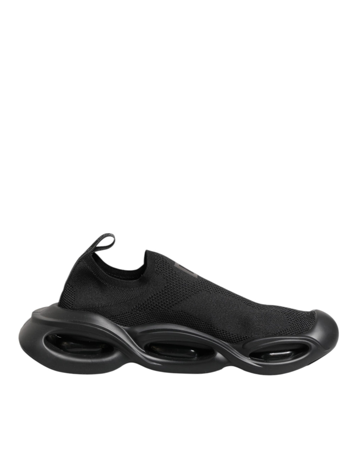 Indulge in the exquisite Dolce & Gabbana Black Slip On Wave Low Top Sneakers, where luxurious materials and Italian craftsmanship meet timeless elegance for the discerning individual.