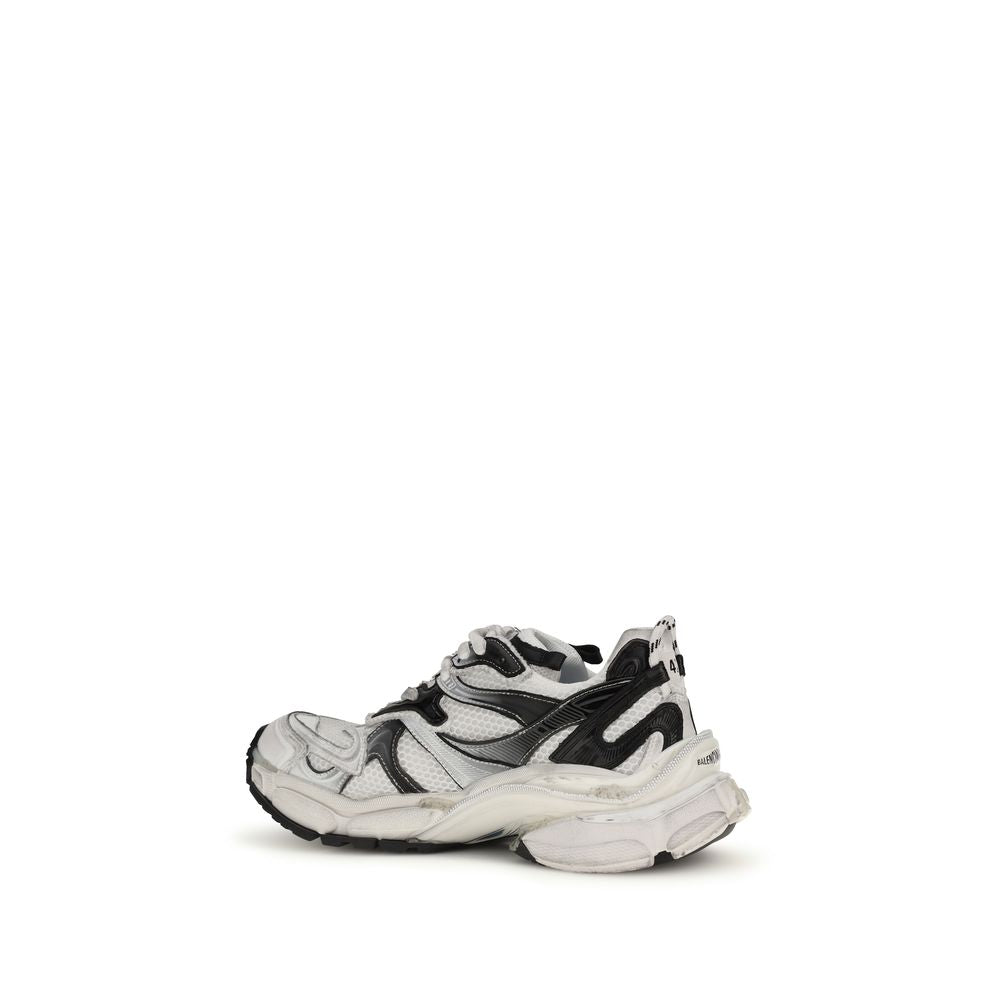 Experience the exquisite Balenciaga Gray Polyethylene Athletic Sneakers, where avant-garde design meets luxurious craftsmanship, elevating your urban style to new heights.