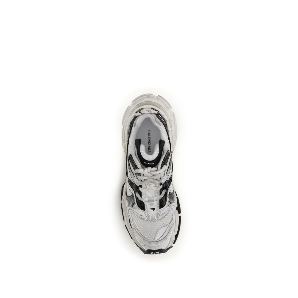 Step into a realm of exquisite urban elegance with Balenciaga Gray Polyethylene Athletic Sneakers, where innovative craftsmanship meets avant-garde design for the discerning individual.