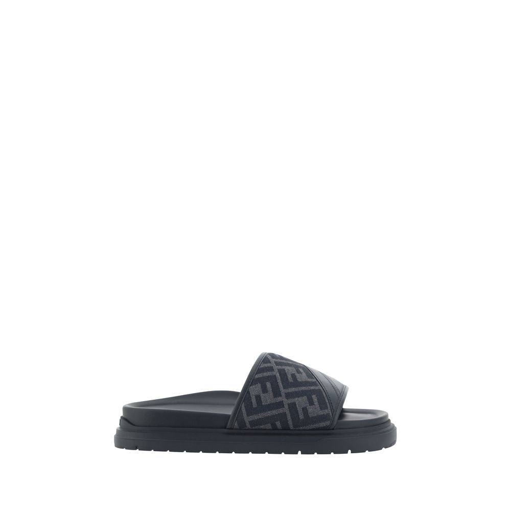 Discover the Fendi Gray Fabric Flat Sandals, a seamless blend of luxury and comfort, crafted for those who embrace elegance in every step.