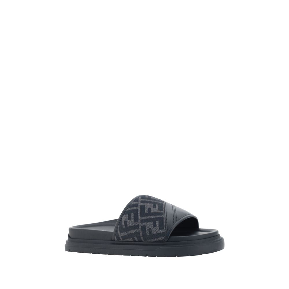 Step into elegance with Fendi Gray Fabric Flat Sandals, crafted from luxurious jacquard for effortless sophistication and comfort, perfect for any stylish occasion.