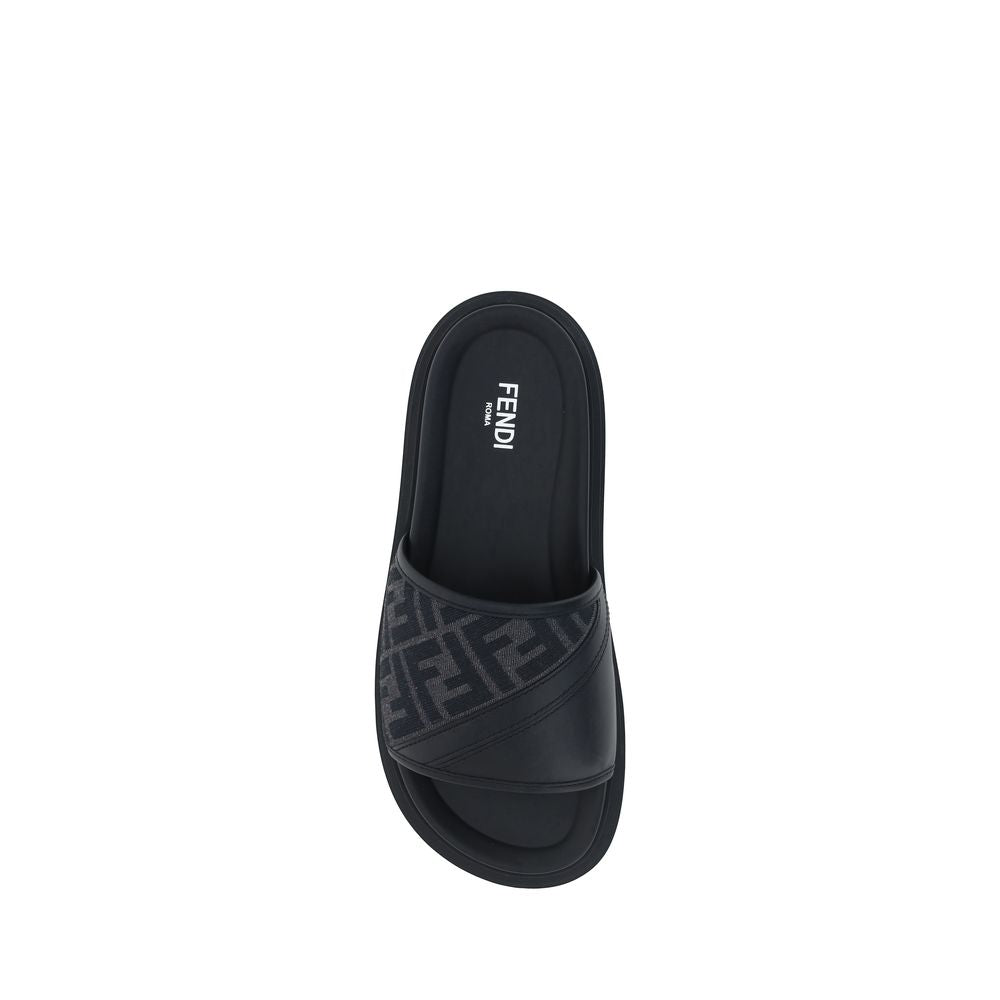 Elevate your summer style with Fendi Gray Fabric Flat Sandals, crafted from luxurious jacquard for unmatched comfort and sophistication in every step.