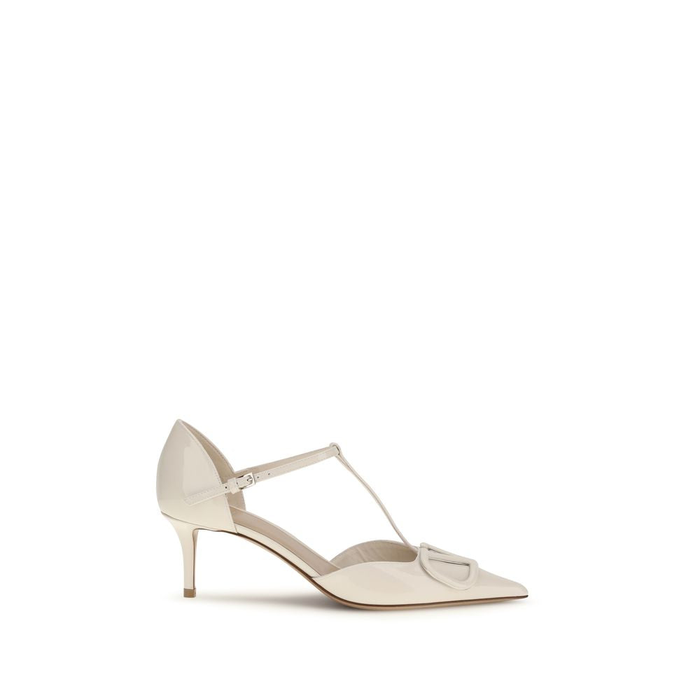Indulge in the elegance of Valentino Garavani's Black Calf Leather Bos Taurus High Heel Pumps, a timeless masterpiece that embodies luxury and sophistication for the modern connoisseur.