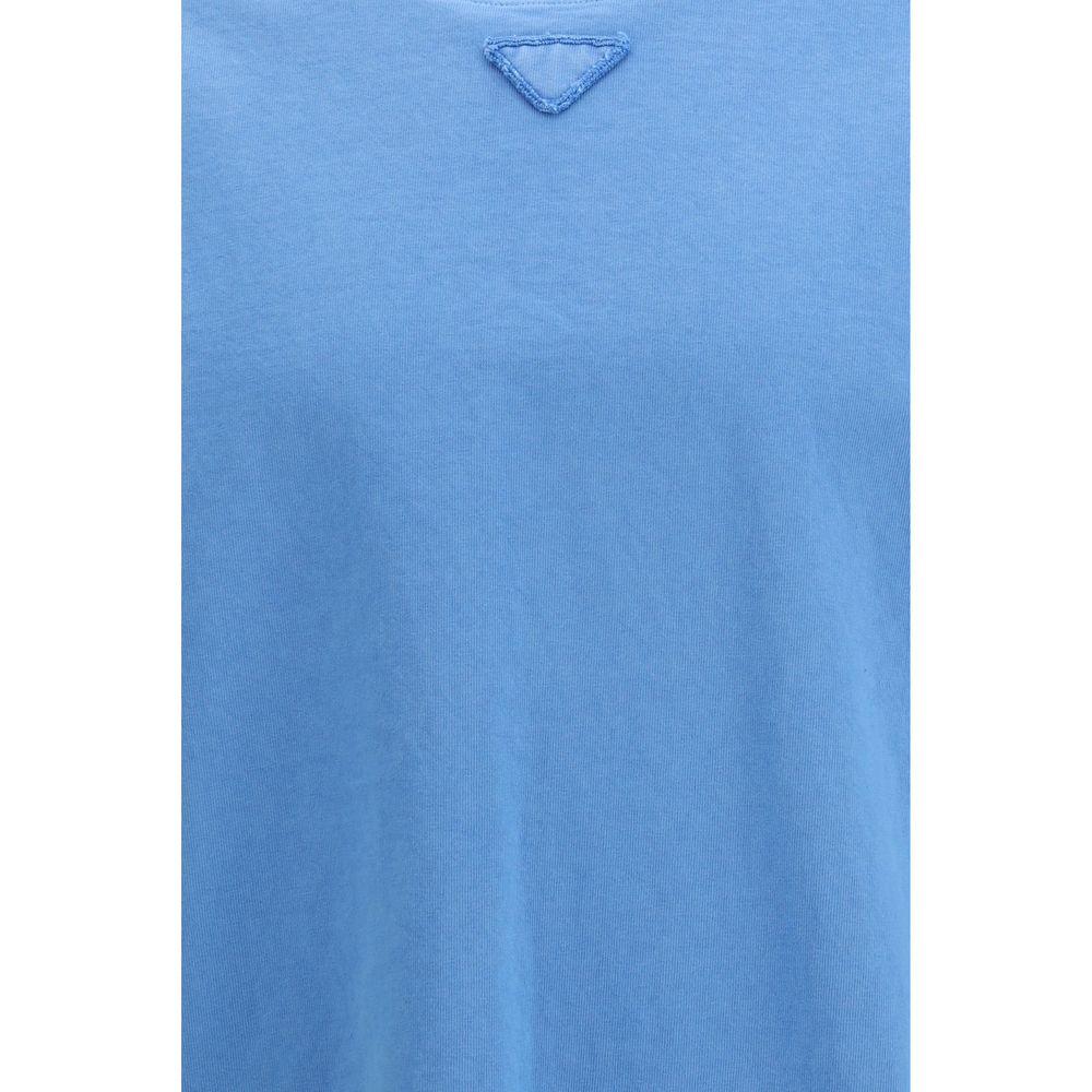 Discover the Prada Blue Cotton T-Shirt, a masterpiece of SS26 elegance crafted from 100% cotton, merging luxurious comfort with timeless sophistication.