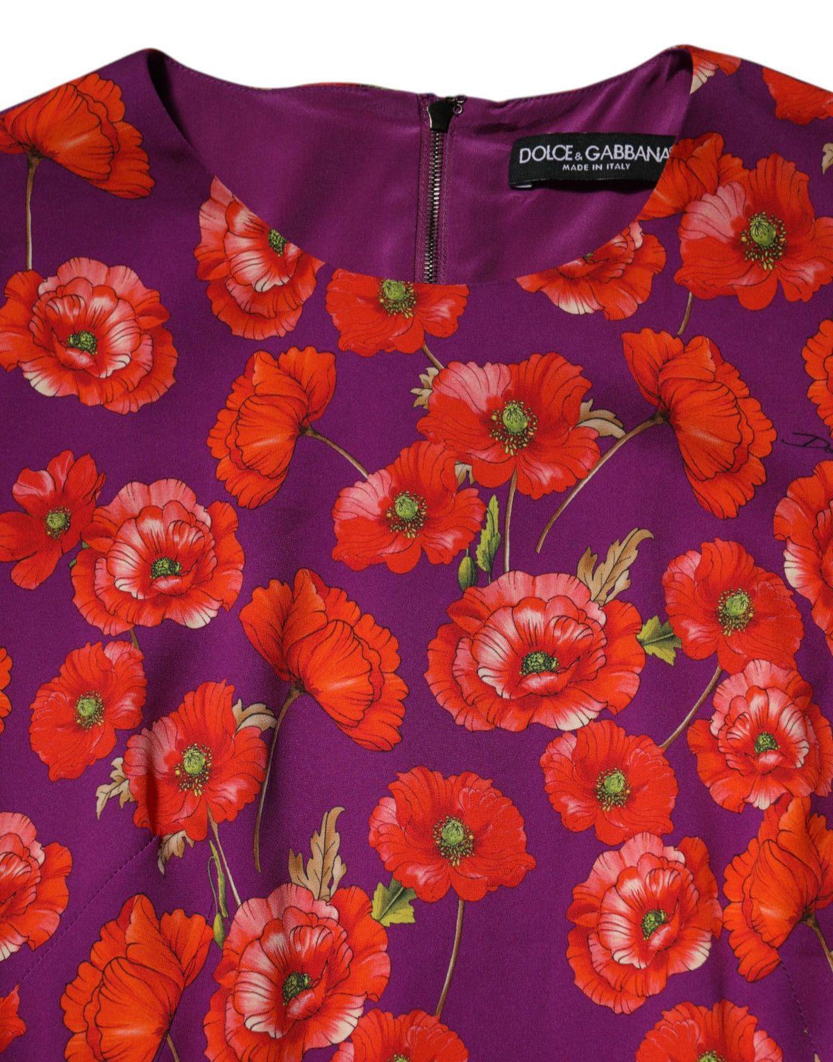 Indulge in the exquisite Dolce & Gabbana Purple Silk Floral Print Midi Sheath Dress, where Italian craftsmanship meets luxurious silk, redefining elegance for every occasion.