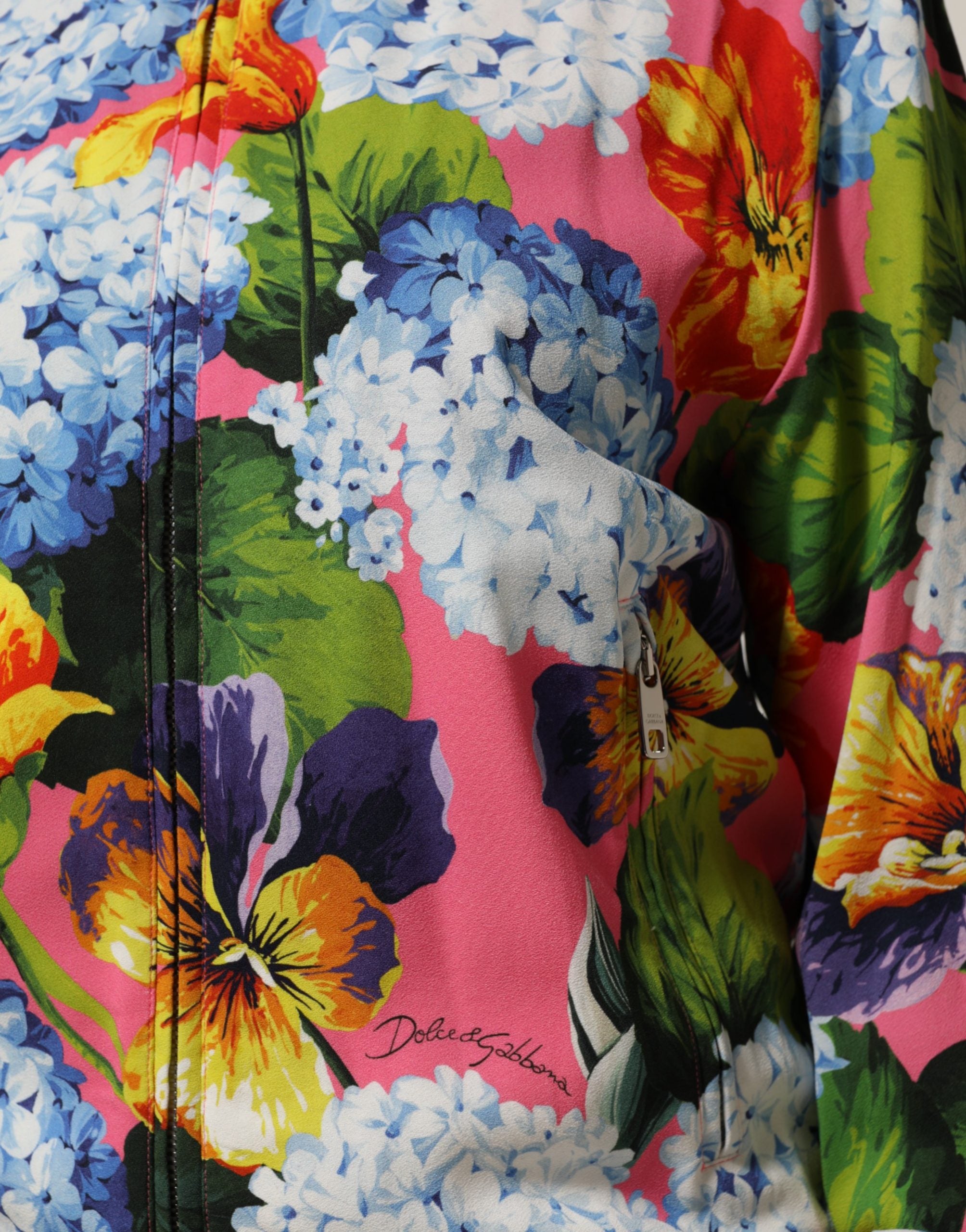 Elevate your style with the Dolce & Gabbana Multicolor Floral Print Zip Cardigan Jacket, a luxurious blend of 96% viscose and 4% elastane, crafted in Italy for the discerning connoisseur.