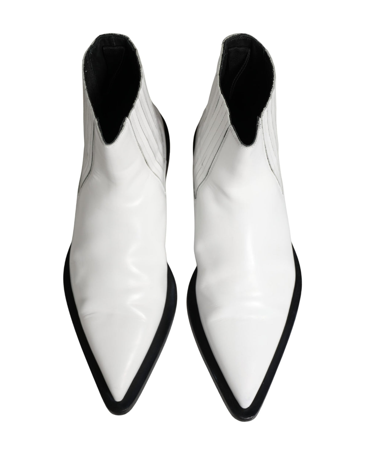 Elevate your style with Dolce & Gabbana's white leather Chelsea ankle boots, a masterpiece of Italian craftsmanship that embodies timeless elegance and versatility.