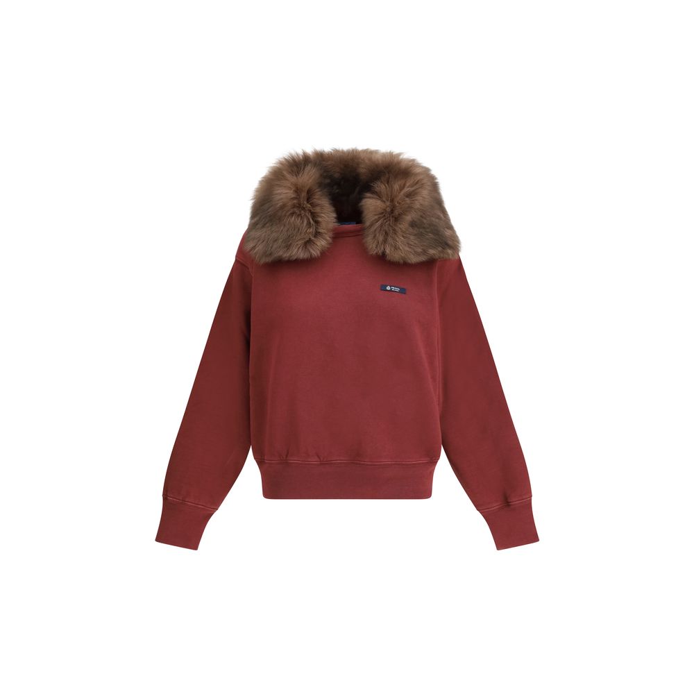 Indulge in the Prada Bordeaux Cotton Sweatshirt, a masterpiece of 100% cotton and plush shearling, embodying effortless sophistication for the discerning individual.