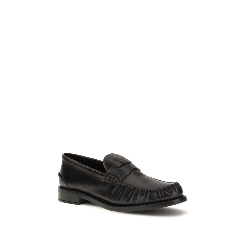 Prada Black Calf Leather Bos Taurus Slip-On Loafers - Luxury Redefined