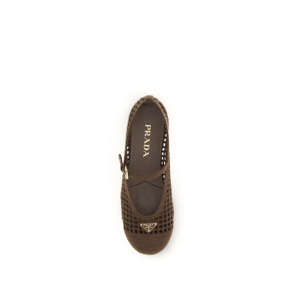 Elevate your style with Prada Brown Cotton Ballet Flats, where handcrafted elegance meets timeless sophistication, perfect for the discerning individual.